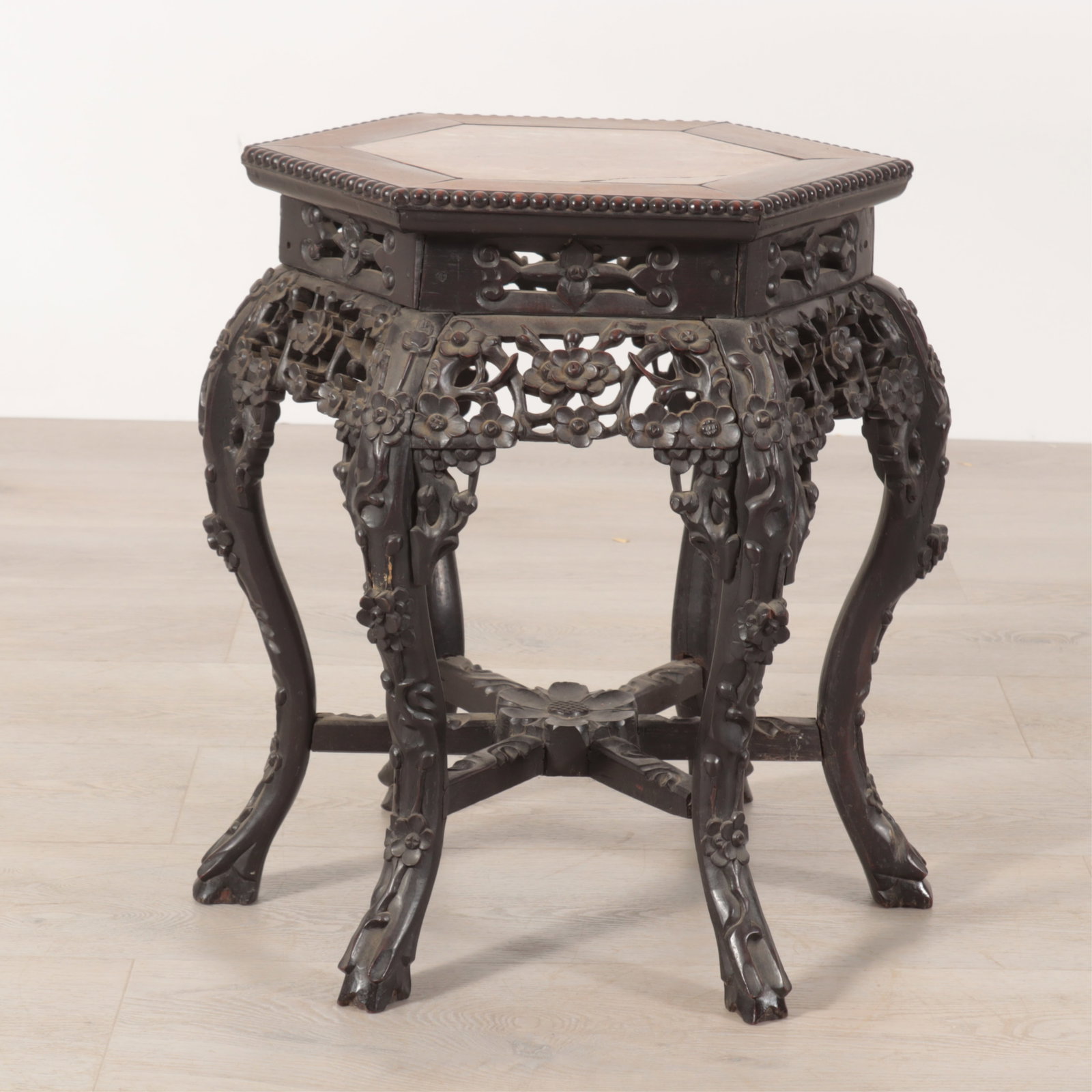 Chinese Hardwood & Marble Pedestal: Chinese hexagonal hardwood pedestal with marble top, late 19th to early 20th century. Dimensions: 19.25" H x 14.5" W Property from a Mount Vernon, NY estate.