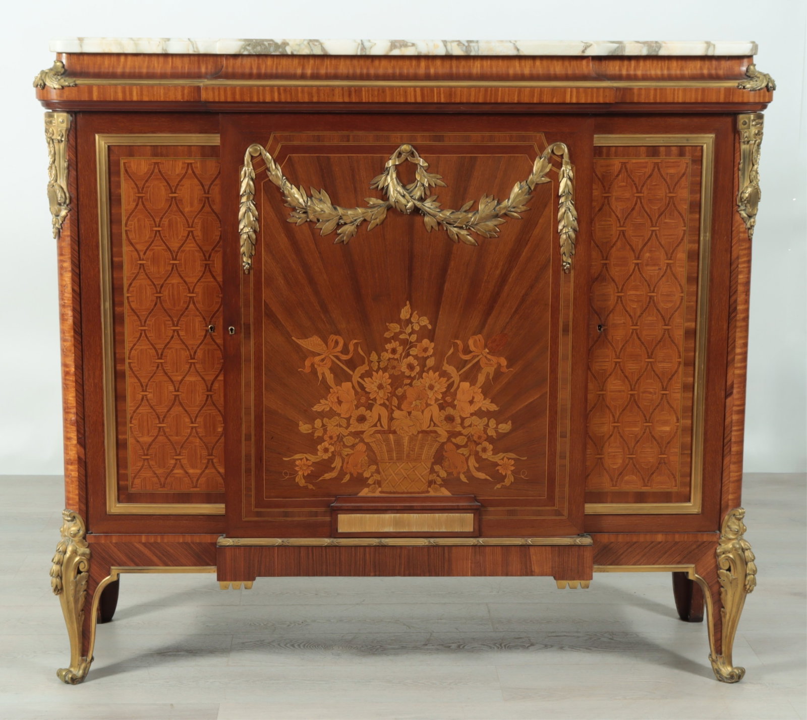 Louis XV Style Ormolu Mounted Marquetry Cabinet: Louis XV Style Ormolu Mounted Marquetry Cabinet, Early 20th C. Center section with two doors enclosing two shelves, two outside sections with single doors enclosing two more shelves. Dimensions:
