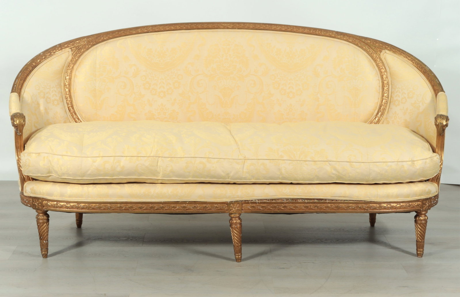 Louis XVI Style Giltwood Canape: Louis XVI Style Giltwood Canape upholstered in Scalamandre style yellow damask. Dimensions: 41" H x 89" W x 37" D Property from a Bronxville Estate.