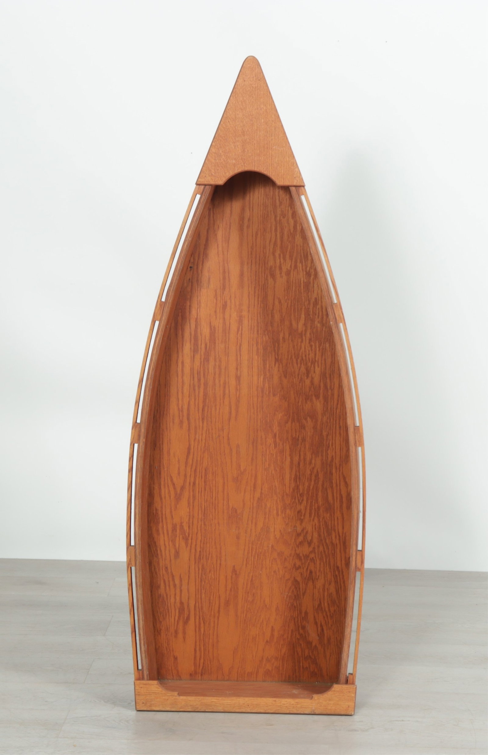 J.M. Gillespie Oak Boat-Form Shelf: J.M. Gillespie, Oak Hall, Virginia. Bent oak bookshelf in the form of a boat.