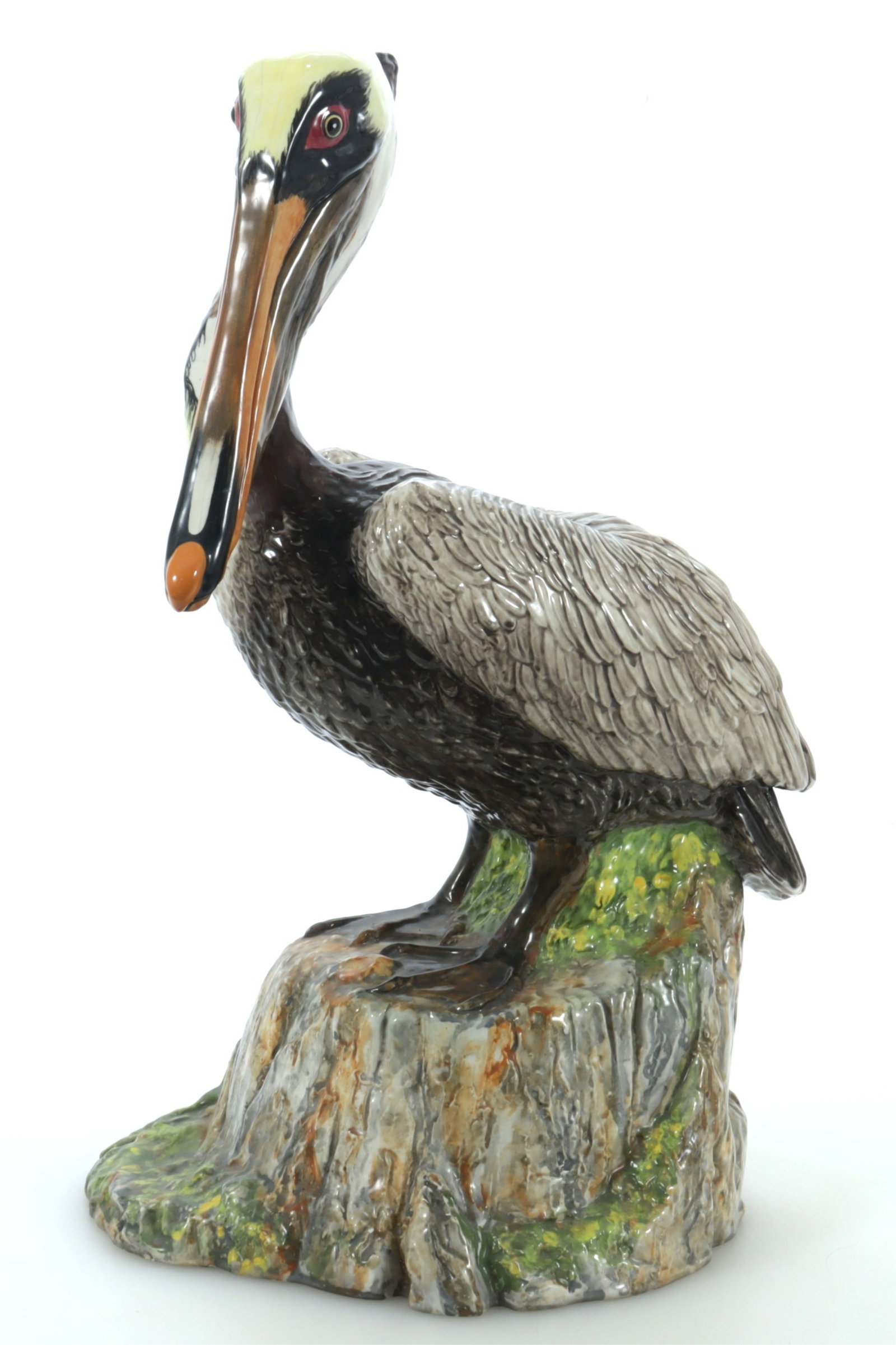 Vintage Life-Size Majolica Pelican: A vintage hand-painted ceramic life-sized standing pelican, signed The Townsends 1972.