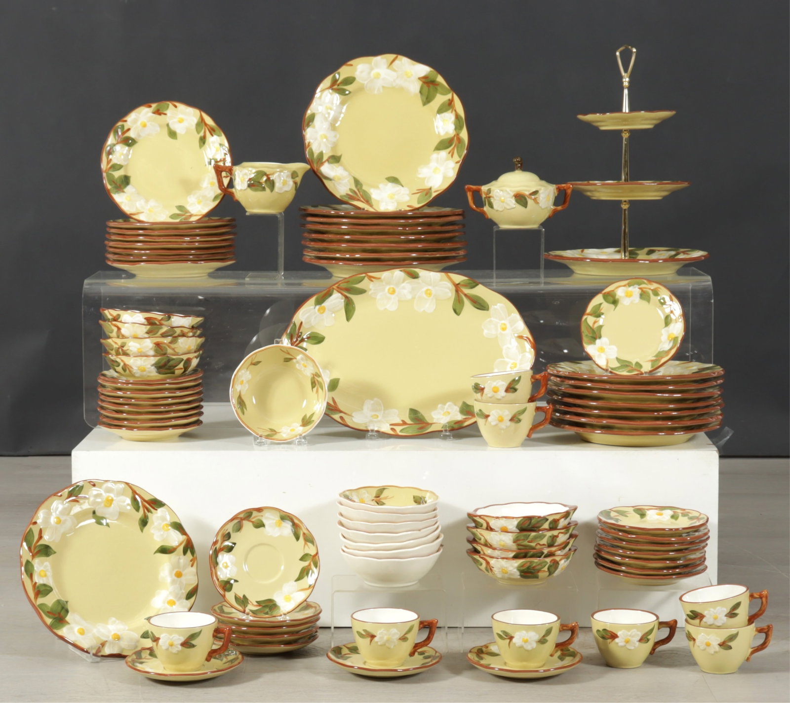 Stangl "White Dogwood" Dinner Service: Stangl "White Dogwood" ceramic 68-piece dinner service comprising: 16 dinner plates, 8 salad/dessert plates, 8 cups with 8 saucers, 8 bread plates, 8 small bowls, 8 handled bowls. Serving pieces