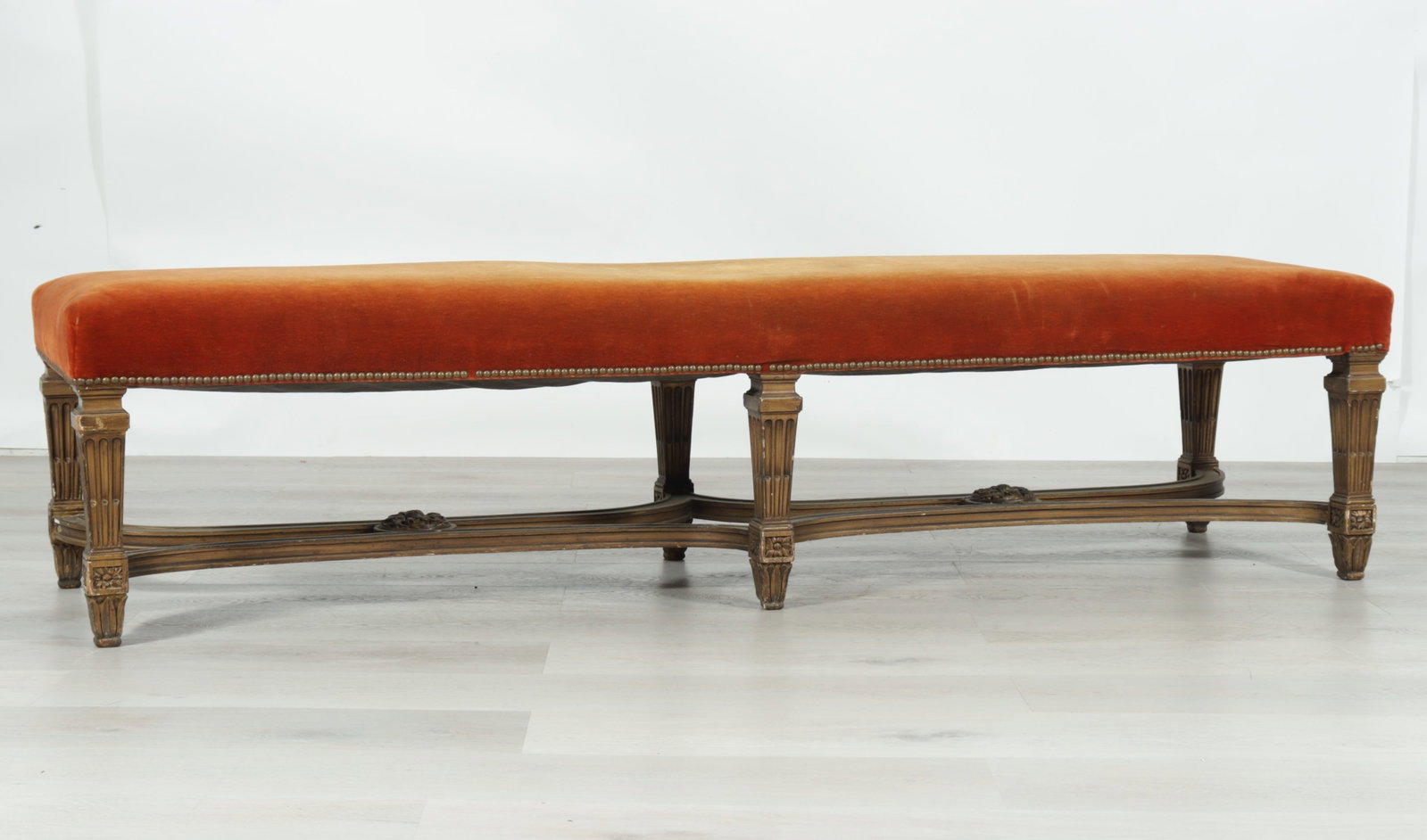 Louis XV Style Giltwood Banquette: Louis XV Style Giltwood Banquette, Early 20th C., upholstered in orange velour