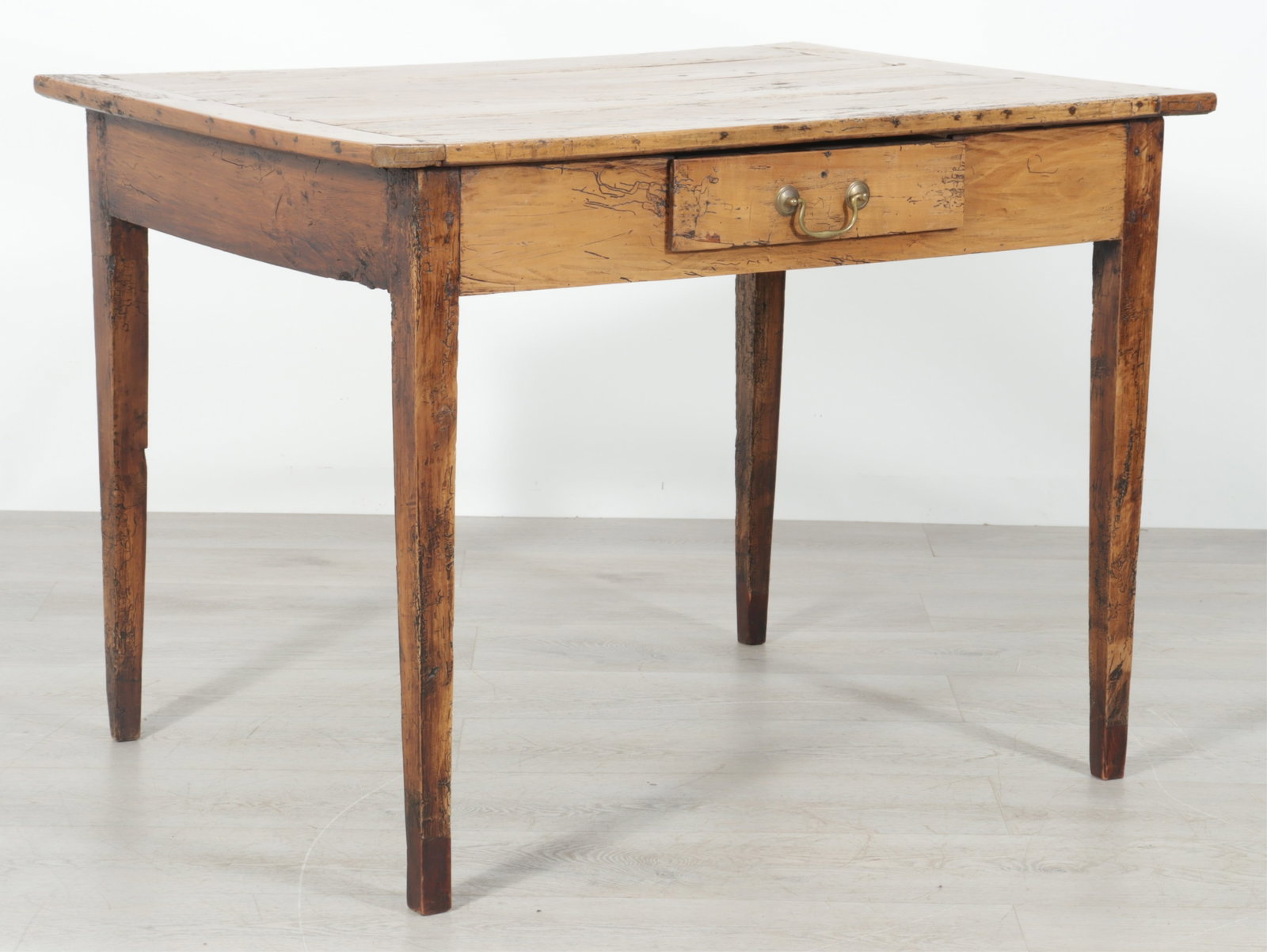 English Country Pine Desk: English country pine writing desk with single frieze drawer.