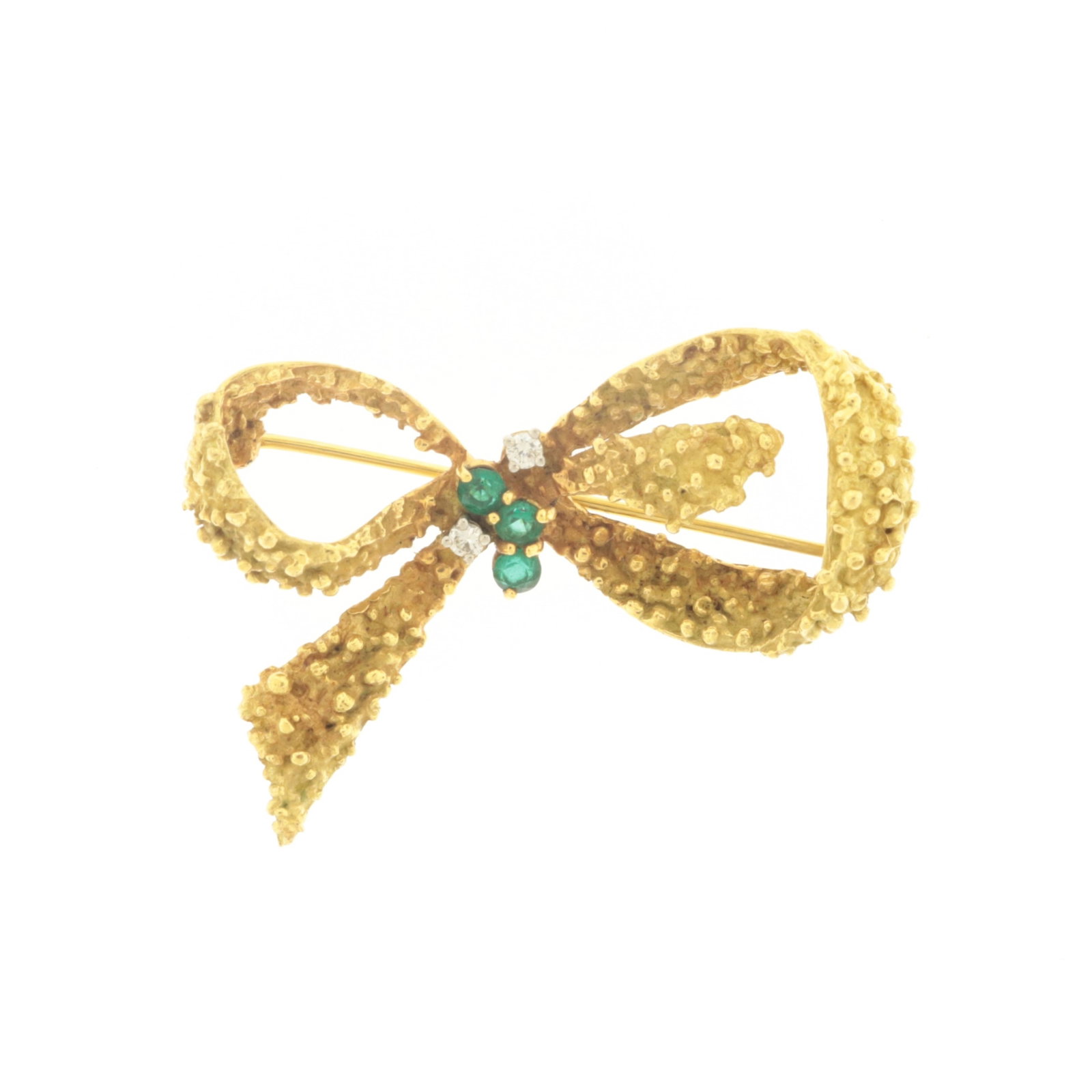 Vintage 18K Gold Diamond & Emerald Bow Brooch: A vintage 18k yellow gold bow-form brooch with bark texture finish, centered with three round emeralds and two round diamonds. Back stamped 18K UC (C). Gross weight of 11.8 grams. 1 3/4" wide
