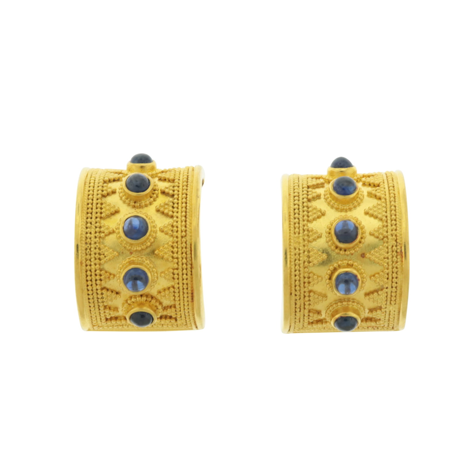 Pair of Lalaounis 18K and Sapphire Earrings: A pair of vintage Lalaounis 18 karat yellow gold clip earrings with five sapphire cabochons flanked by beaded zig-zag edge. Back stamped A17 / 750 / Maker's Mark / Greece. Weighing 20.6 grams. 0.75"