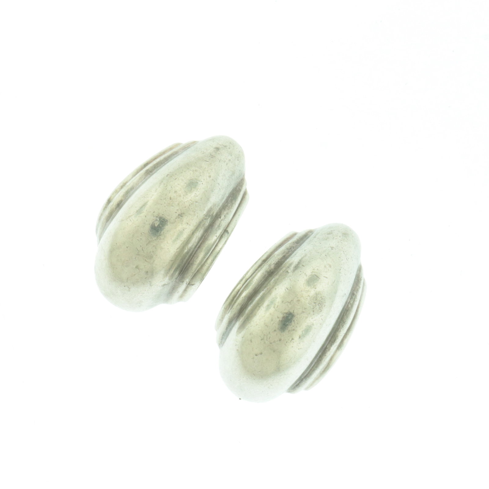 Tiffany & Co Paloma Picasso Vendome Earrings: Pair of vintage Paloma Picasso for Tiffany & Co sterling silver Vendome half hoop earrings. Signed to interior. Weighing 9.8 grams. About 3/4" long x 1/2" wide Property from an Alpine, New Jersey esta