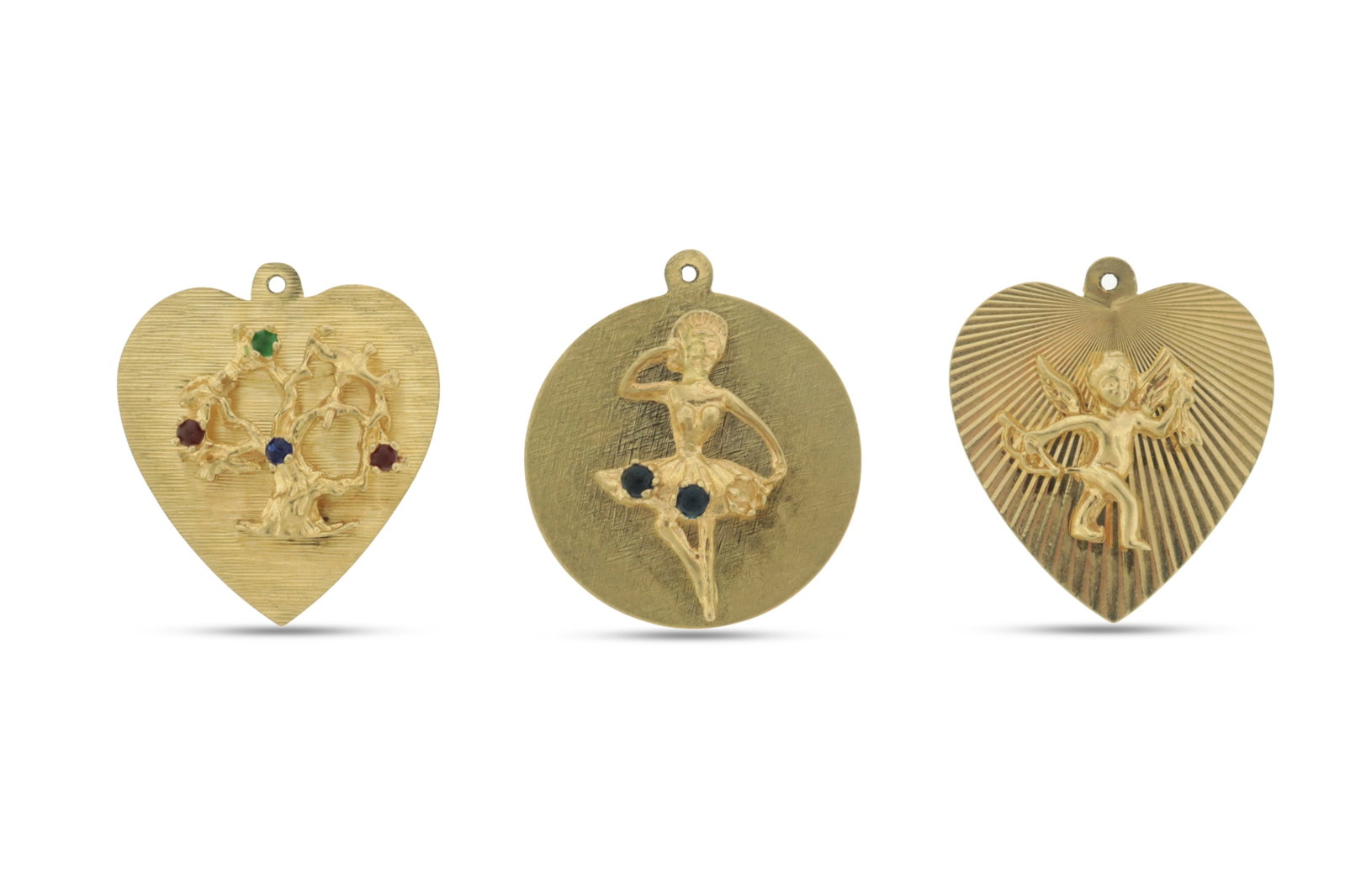 Three Vintage 14k Gold Charms: Three vintage 14 karat yellow gold tag charms. Comprising: fluted heart with cupid applique, round with ballerina applique and two blue gems, and heart form with gem-set Tree of Life applique. Gross