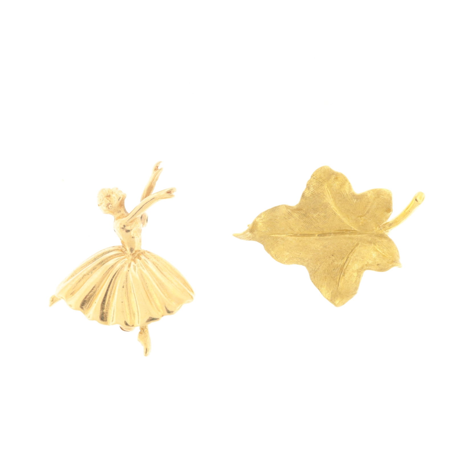 Two 18K Gold Brooches: A vintage 18 karat yellow gold maple leaf brooch together with a vintage 18 karat yellow gold ballerina brooch. Maple leaf stamped on back. Ballerina unmarked, acid tested. Gross weight of 7.1 grams.