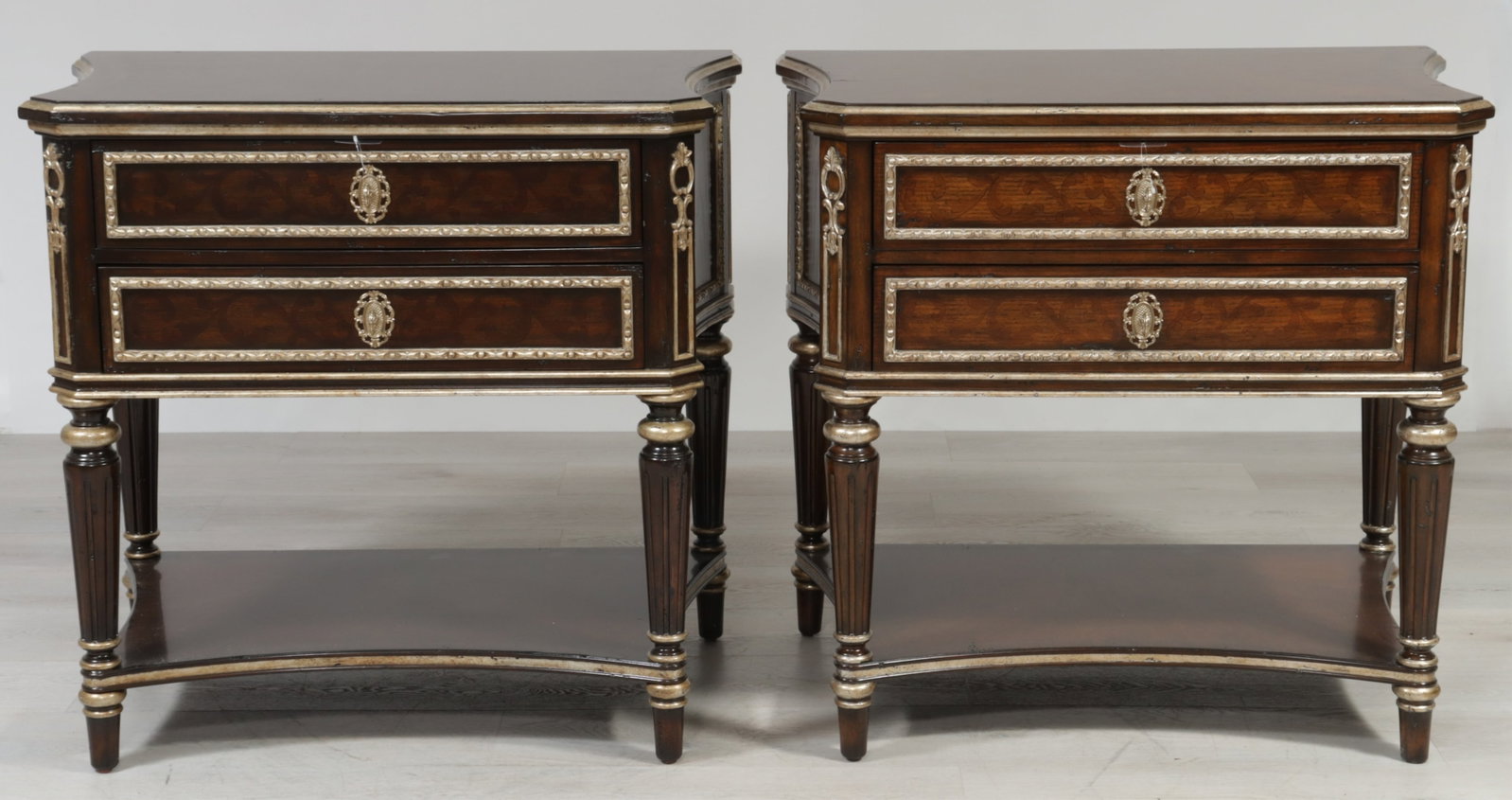 Pair of Marge Carson Trianon Court Side Tables: Pair of Marge Carson Trianon Court silvered walnut stained side tables with two drawers. 33.5" H x 36" W x 23" D