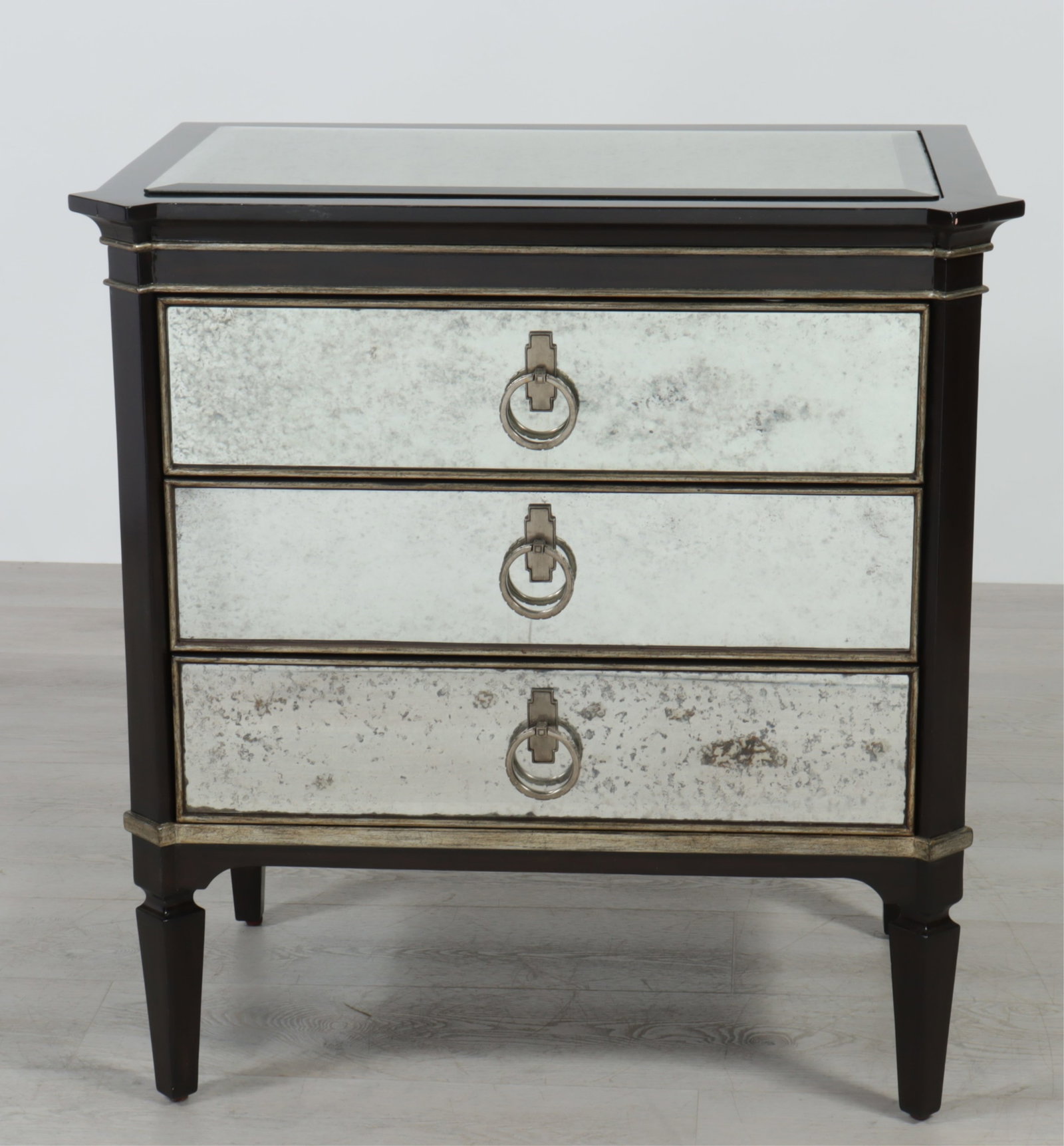 Marge Carson Mirrored Chest: Marge Carson, walnut sidechest with three drawers, antiqued mirror panels. 33.5" H x 32" W x 20.5" D