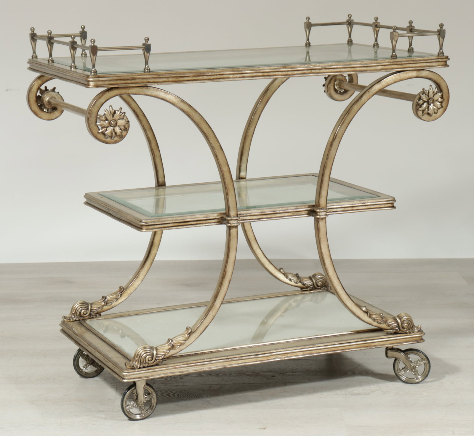 Marge Carson Bar Cart: Marge Carson Bar Cart, silvered metal and wood frame with inset glass shelves. 39.25" H x 40" W x 22.25" D