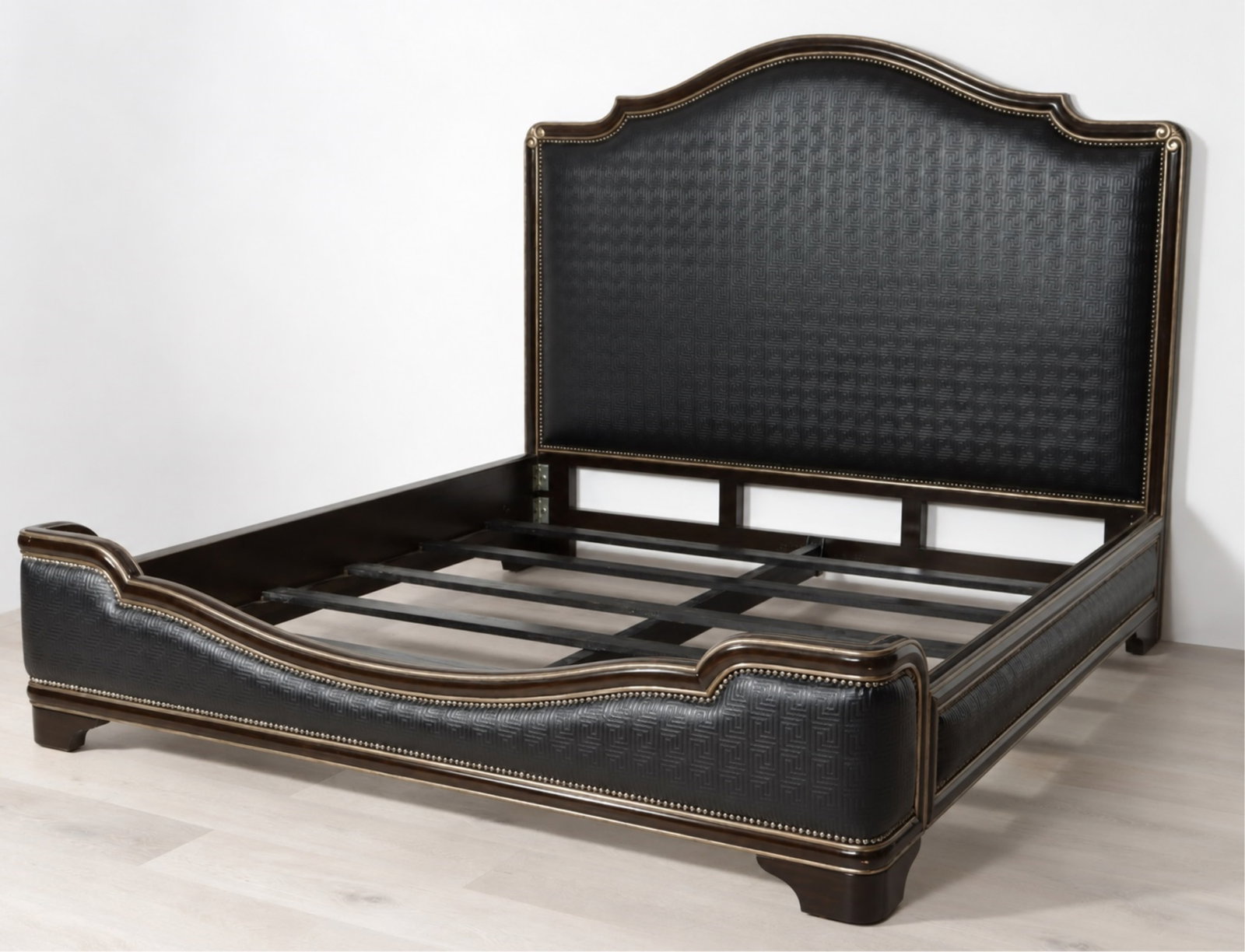 Marge Carson Rivoli King Size Bed: Marge Carson Rivoli king size bed, brass tacked embossed leather frame, ebony and silvered details. 68" H x 88.5" L x 84.5" W