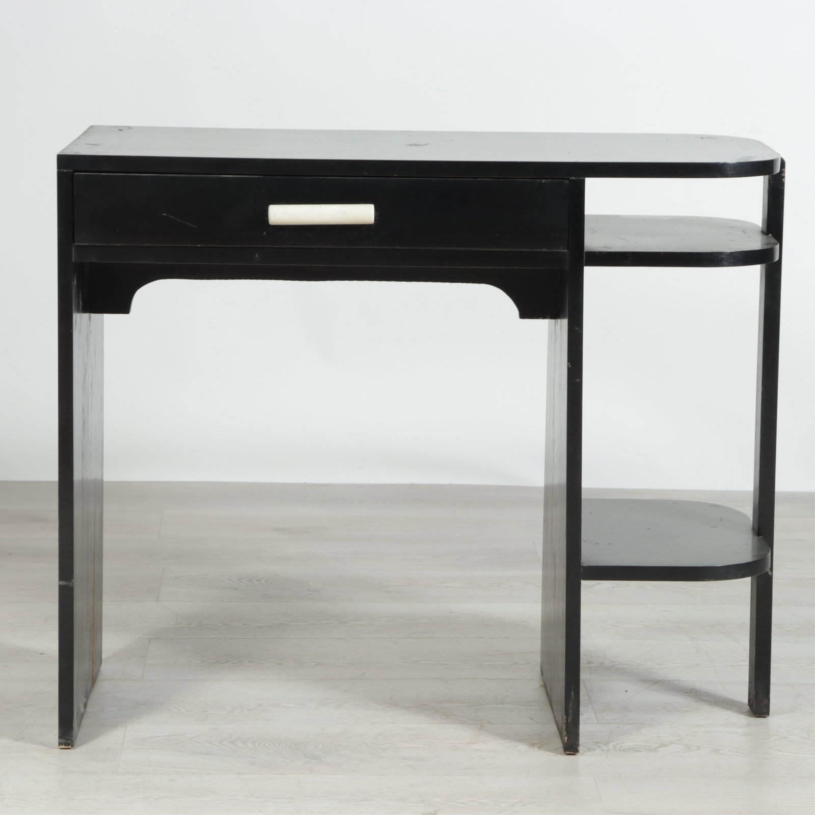 Donald Deskey Style Art Deco Wood Desk: Donald Deskey style Art Deco floating black painted wooden desk, glass top 30 H x 36 W x 15 3/4 D