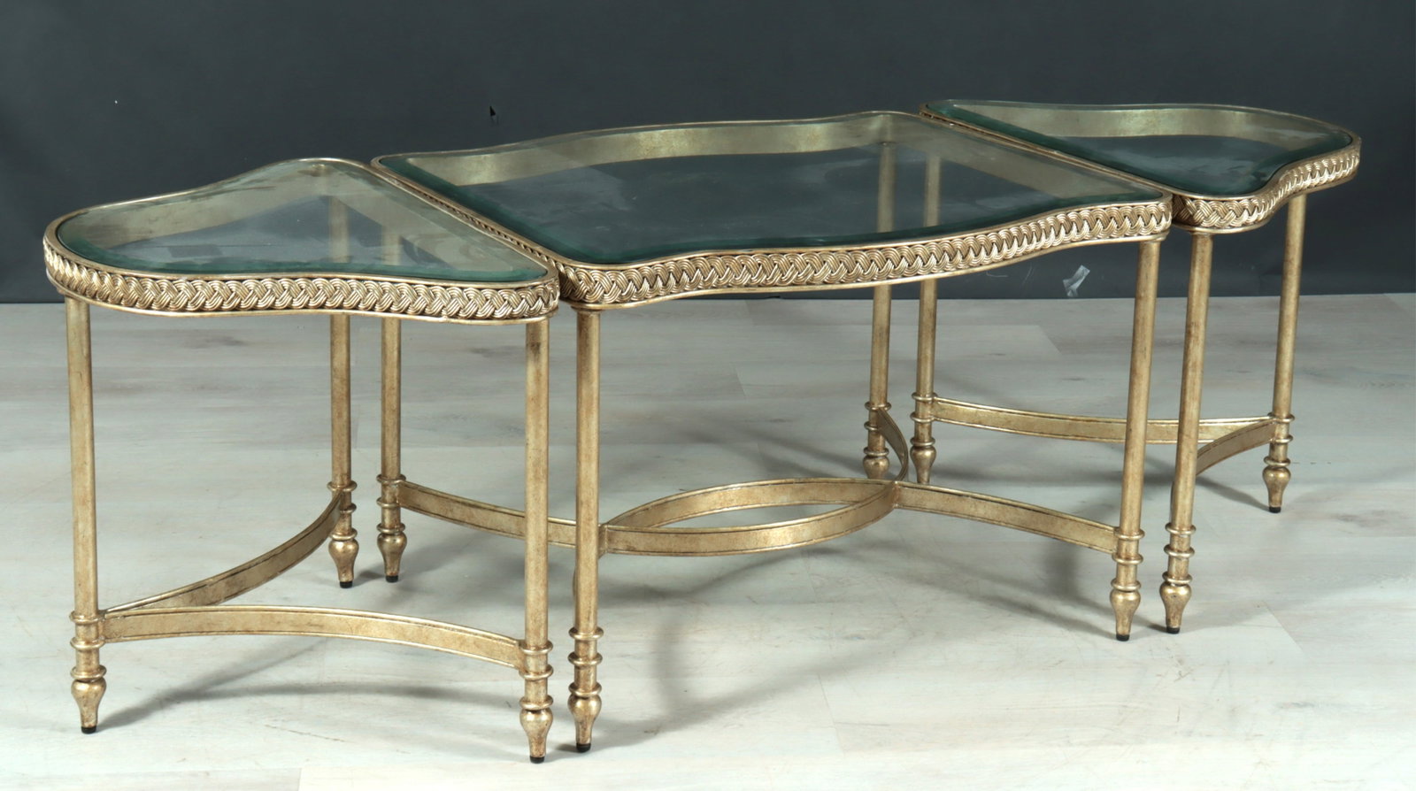 Marge Carson Rue Royale Coffee Table: Marge Carson, three-part Rue Royale silvered metal coffee table with inset beveled glass top. Square 22.5" H x 32.5" W x 29.25" D, pair 22.5" H x 26.5" W x 18.25" D.