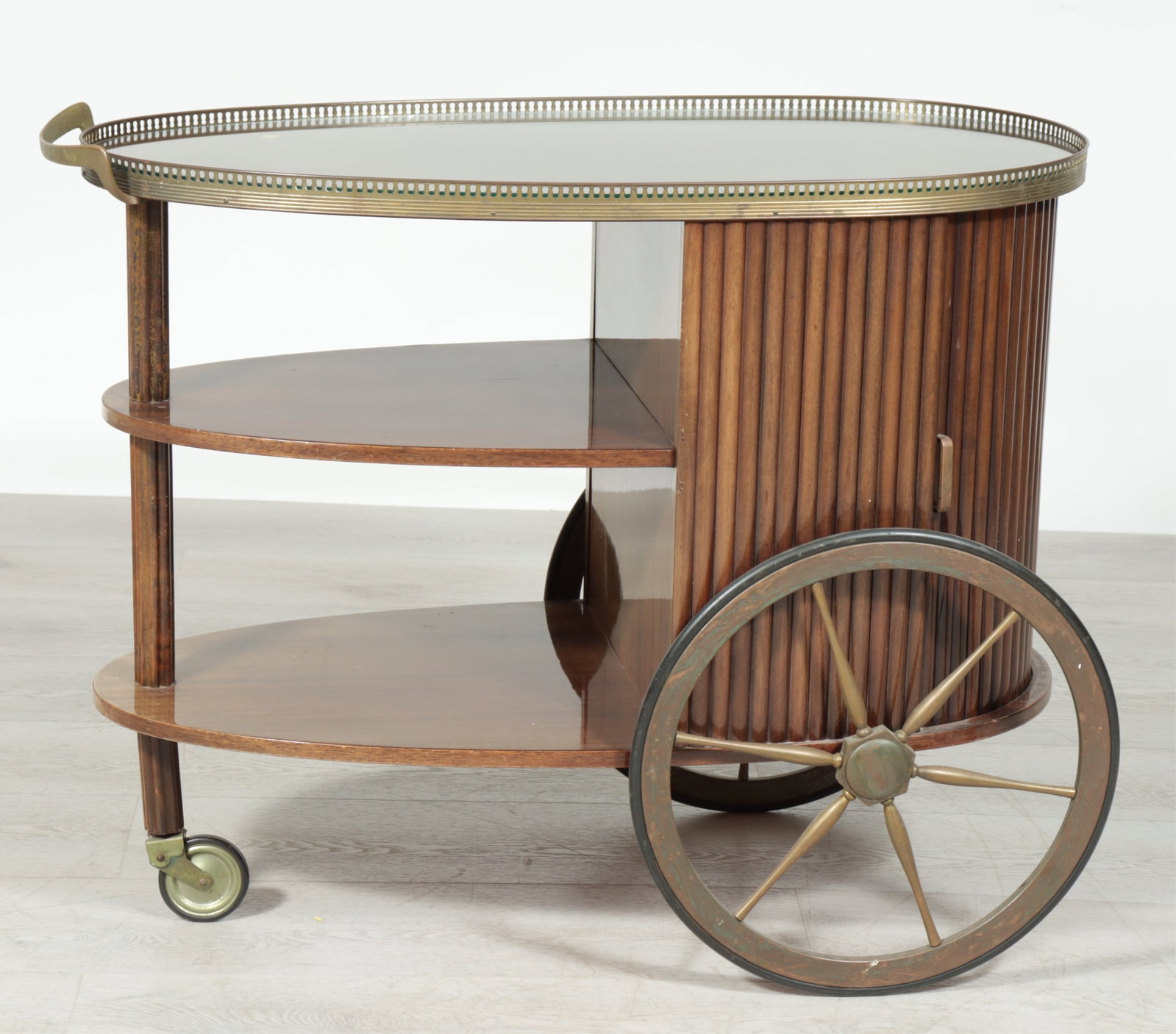 Style of Aldo Tura Bar Cart: Style of Aldo Tura Italian (1909-1963) Art Deco teardrop shaped tambour door mahogany, brass and glass rolling beverage/bar cart 27.75 H x 35 W x 17.75 D