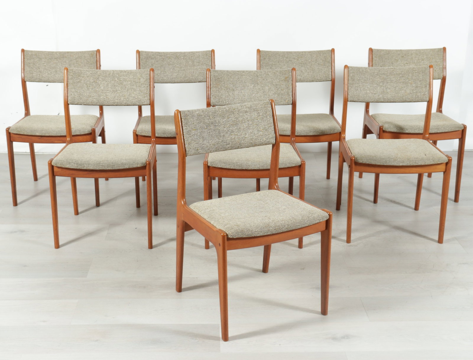 8 Scandinavian Woodworks Co. Teak Dining Chairs: 8 Scandinavian Woodworks Co. Teak Dining Chairs, upholstered in brown woven wool 33.75" H x 19.25" W x 21" D