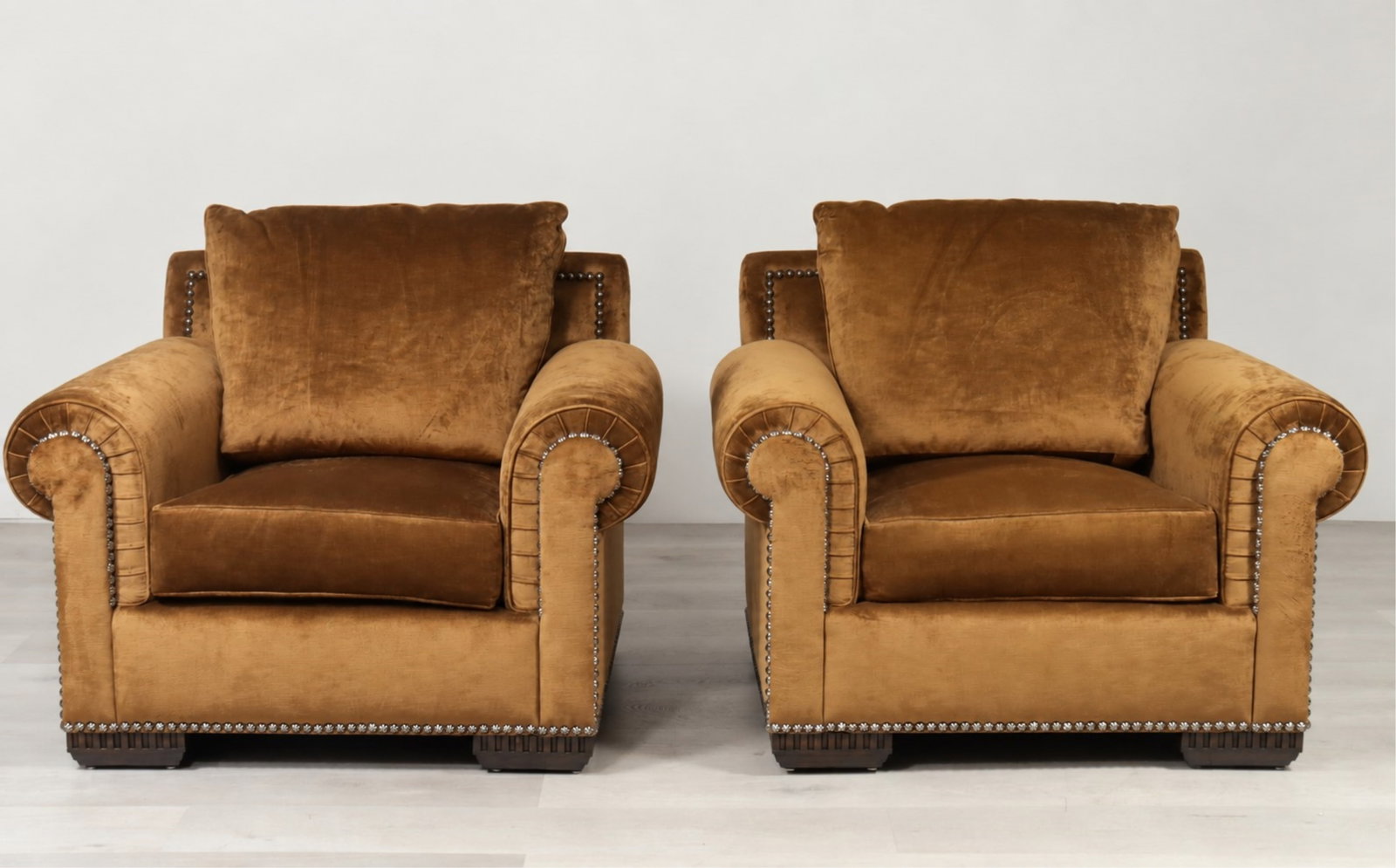 Pair Marge Carson Bentley Club Chairs: Pair Marge Carson Bentley club chairs, upholstered in tacked brown velour. 40" H x 46" W x 37" D