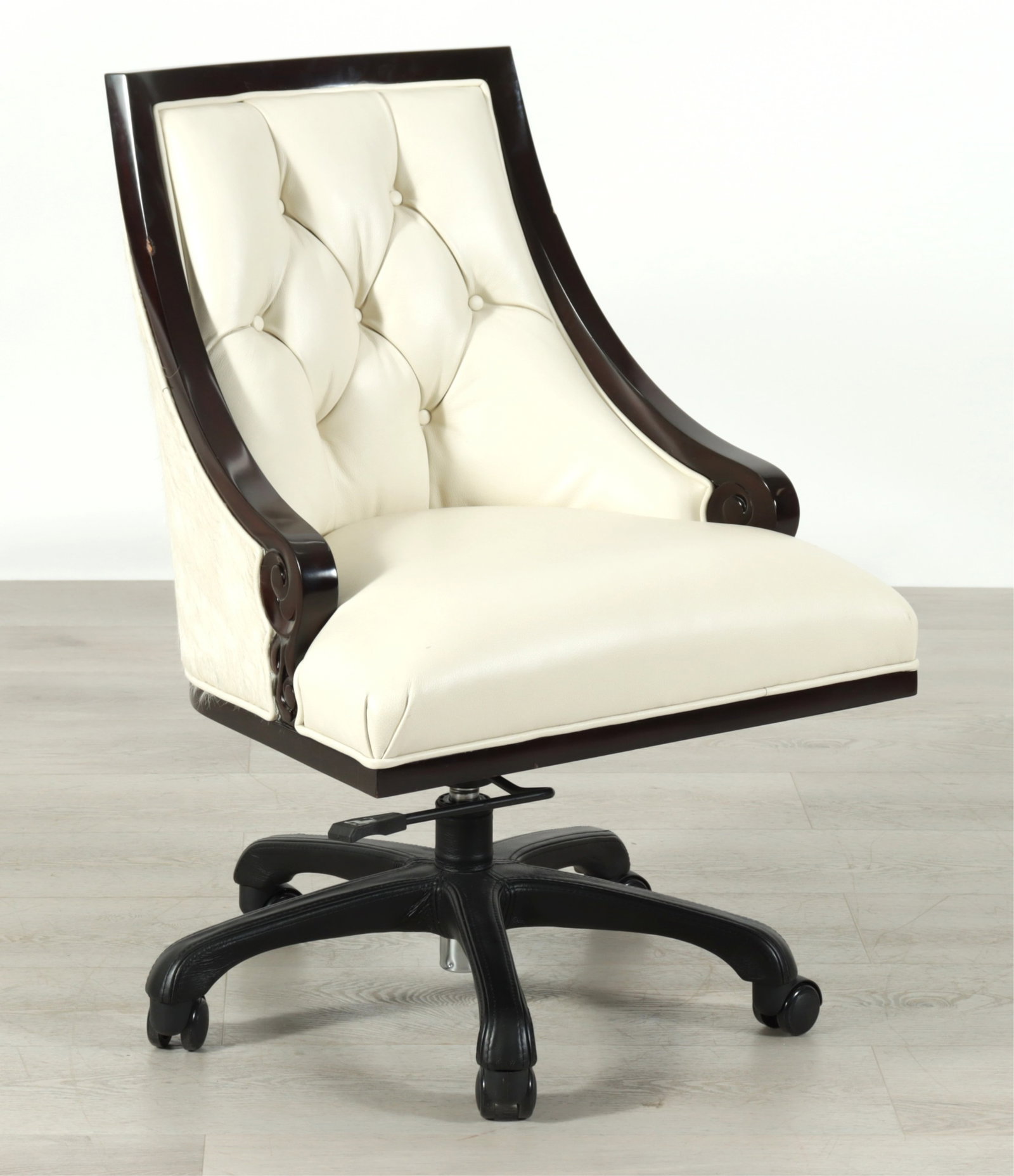 Christopher Guy Megeve Desk Chair: Christopher Guy black lacquer Megeve desk chair upholstered in tufted cream leather & cowhide. 34" H x 24" W x 24.5" D