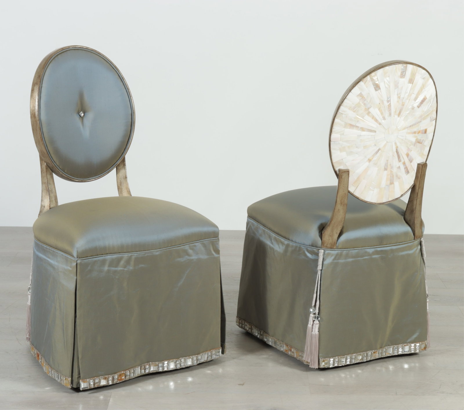 Pair Marge Carson Ophelia Vanity Chairs: Pair Marge Carson Ophelia vanity chairs upholstered in rhinestone trimmed iridescent green fabric, with pearl tessellated back details 38.75" H x 20" W x 18.5" D