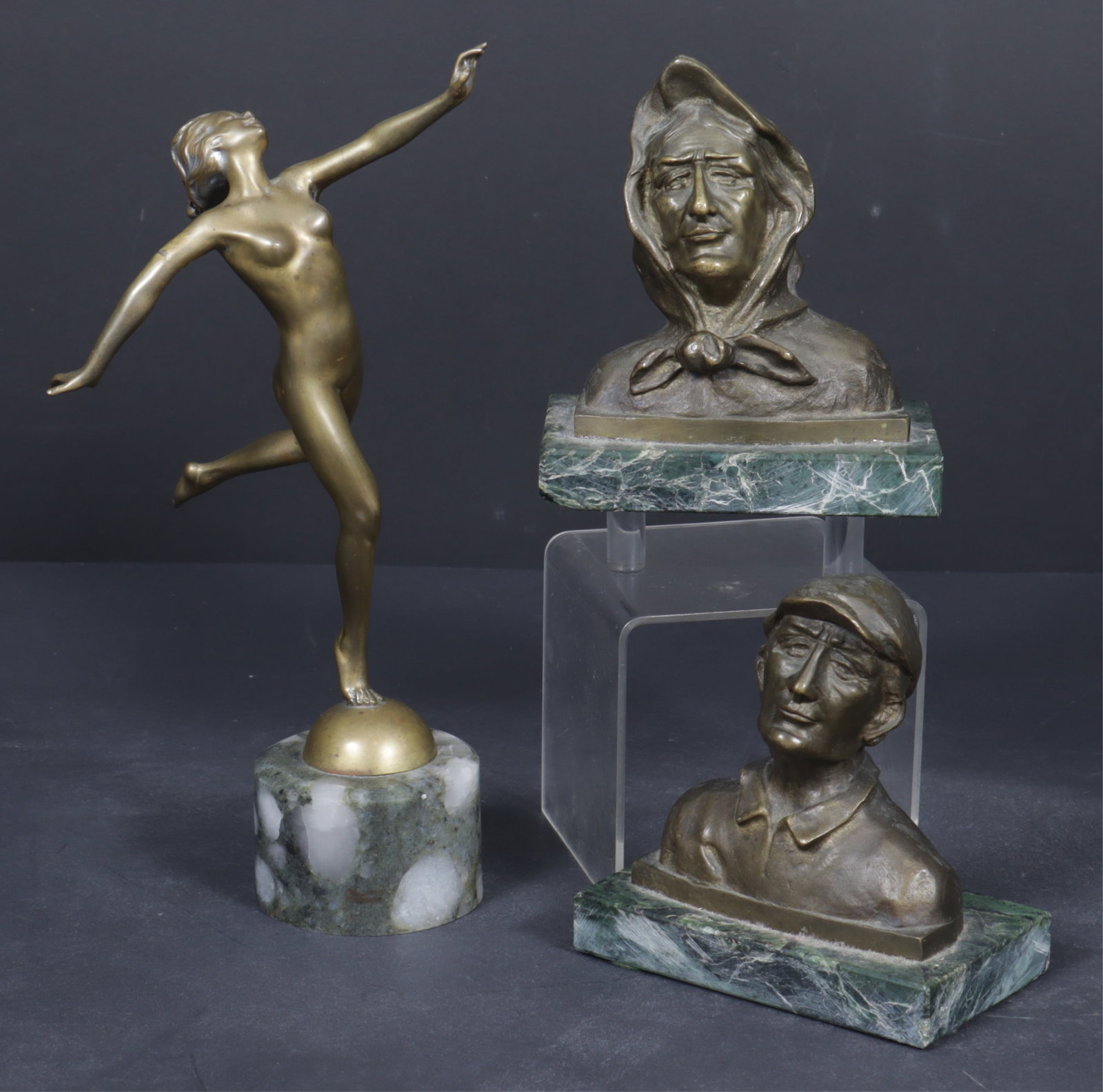 Joseph Lorenzl - Art Deco Dancer & Bookends: Josef Lorenze (Joseph Lorenzl) Austrian, 1892-1950, Art Deco dancer, mounted on stone, signed along domed base along with a possibly Josef Lorenze pair of metal (likely bronze) busts on marble base