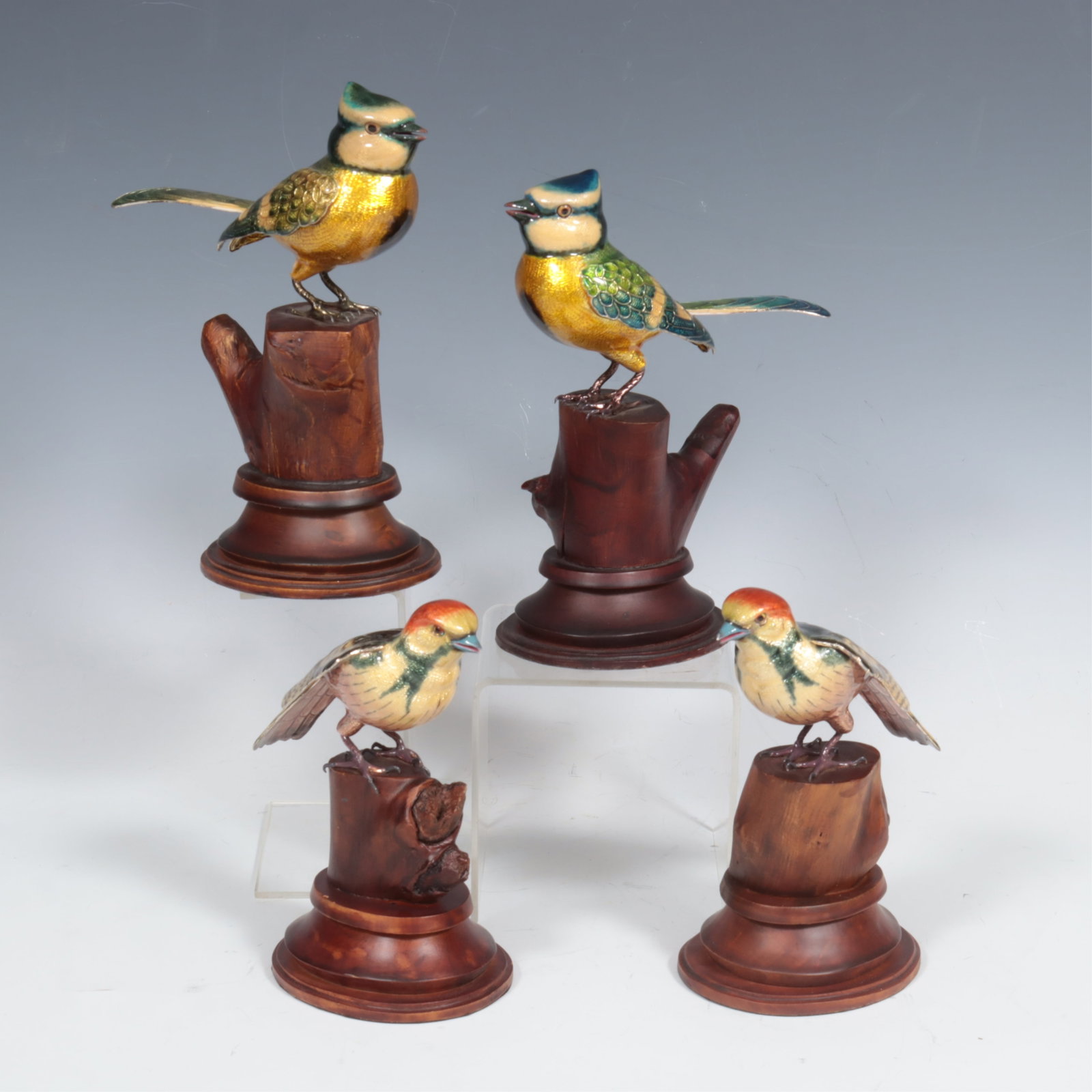 Two Pairs Indian Enameled Copper Birds: Two pairs of Indian enameled copper birds on wooden stands including Woodpecker & Blue Tit. Larger pair 7.5" H