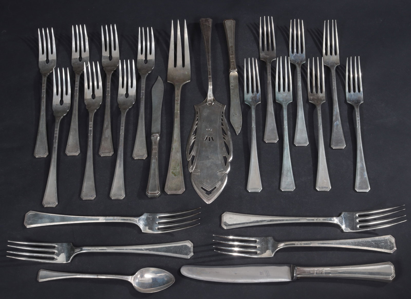 JC Klinkosch Austrian Silver Flatware: Josef Carl Klinkosch, Vienna, Austria, late 19th century .800 silver flatware. Comprising: four dinner forks, seven luncheon forks, seven salad forks, one teaspoon, two solid knives, one stainless
