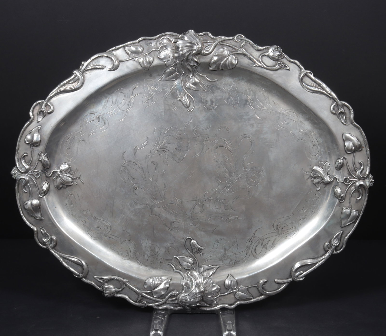 19th Century Austrian Silver Tray: Austrian .800 silver floral repousse oval tray, late 19th century. Stamped with 1867-1872 Dianakopf and worn maker's mark, possibly Eduard Steiter. 46.37 OZT. 21.5" x 17.25"