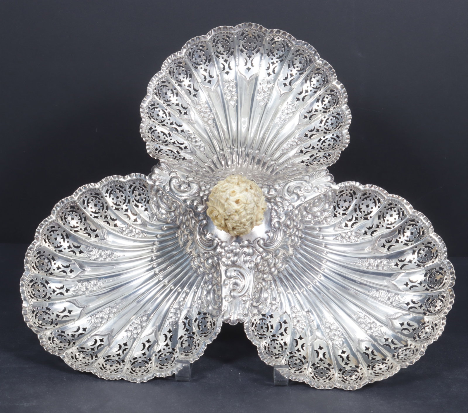 Atkin Brothers Sterling Silver: Atkin Brothers, successors to Henri Atkin, Sheffield, large sterling silver serving dish with elaborate pierced and floral repousse motif, floral carved bone knob, circa 1896. Gross weight of 26.25