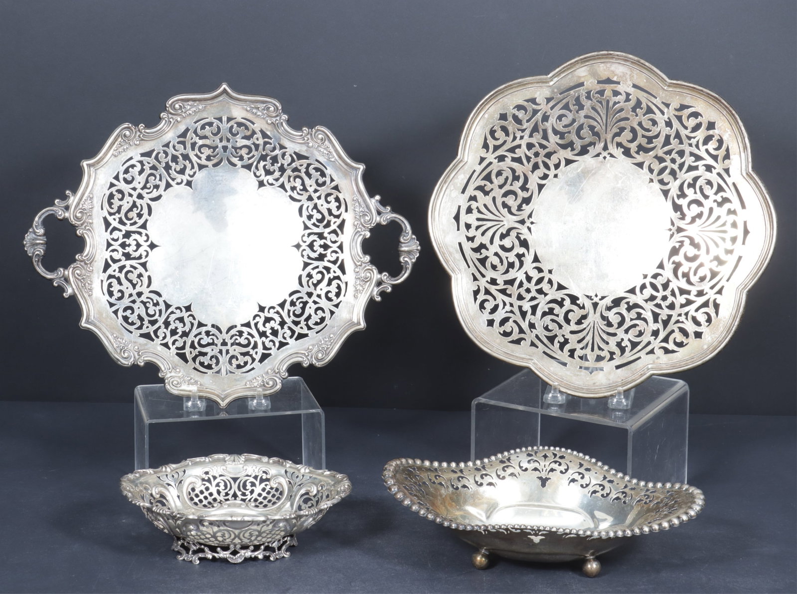 Gorham Sterling Silver Reticulated Serving Pieces: Gorham and Woodside reticulated sterling silver serving pieces, comprised of two Gorham .925 serving trays, numbered 6037A and 6033A ; one bowl numbered 3855 along with a Woodside New York monogrammed