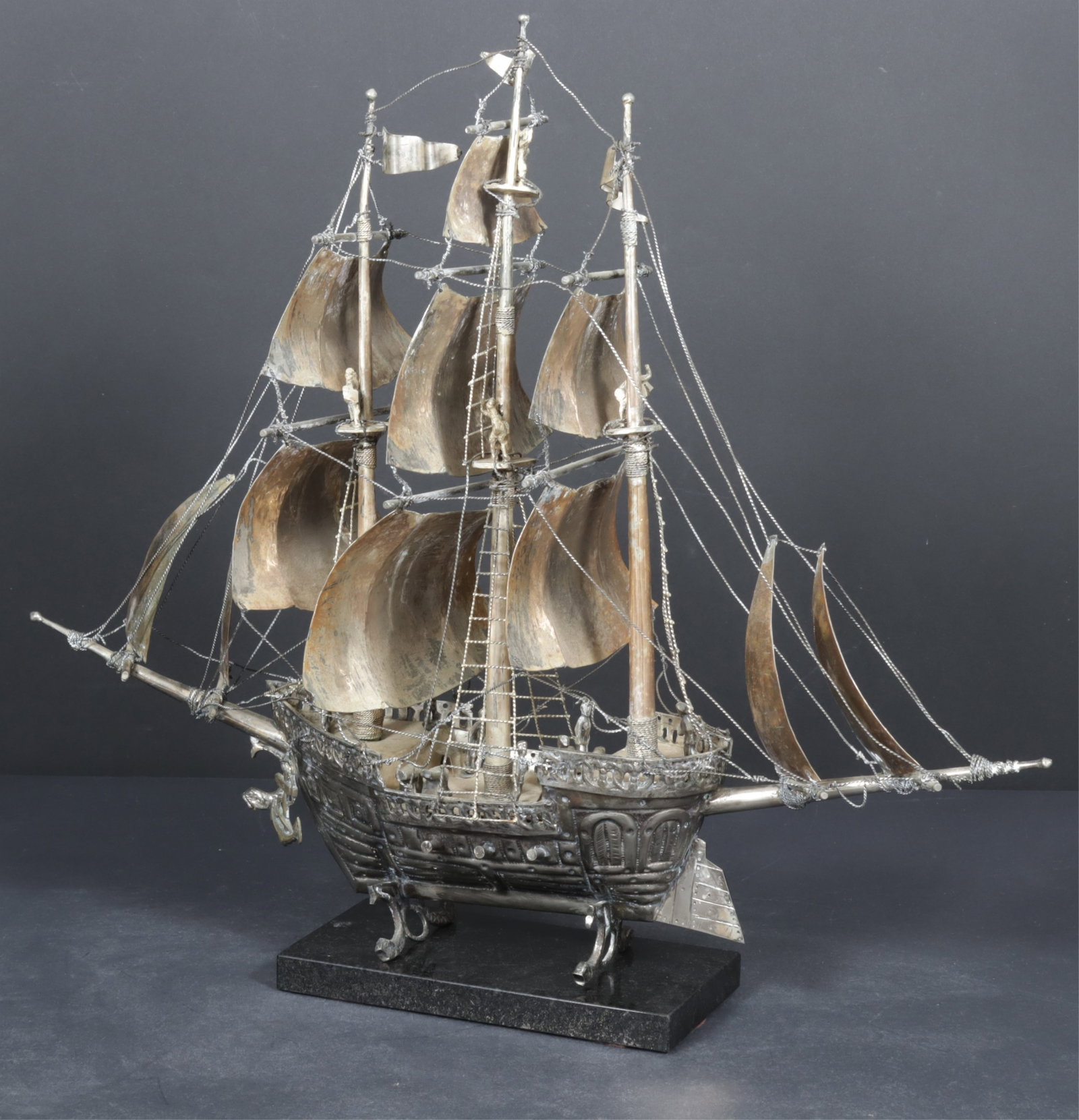 Continental Silverplate Nef: A Continental silver plate Nef (Dutch Clipper Ship) on top black stone base 18 H x 22 W x 9 D