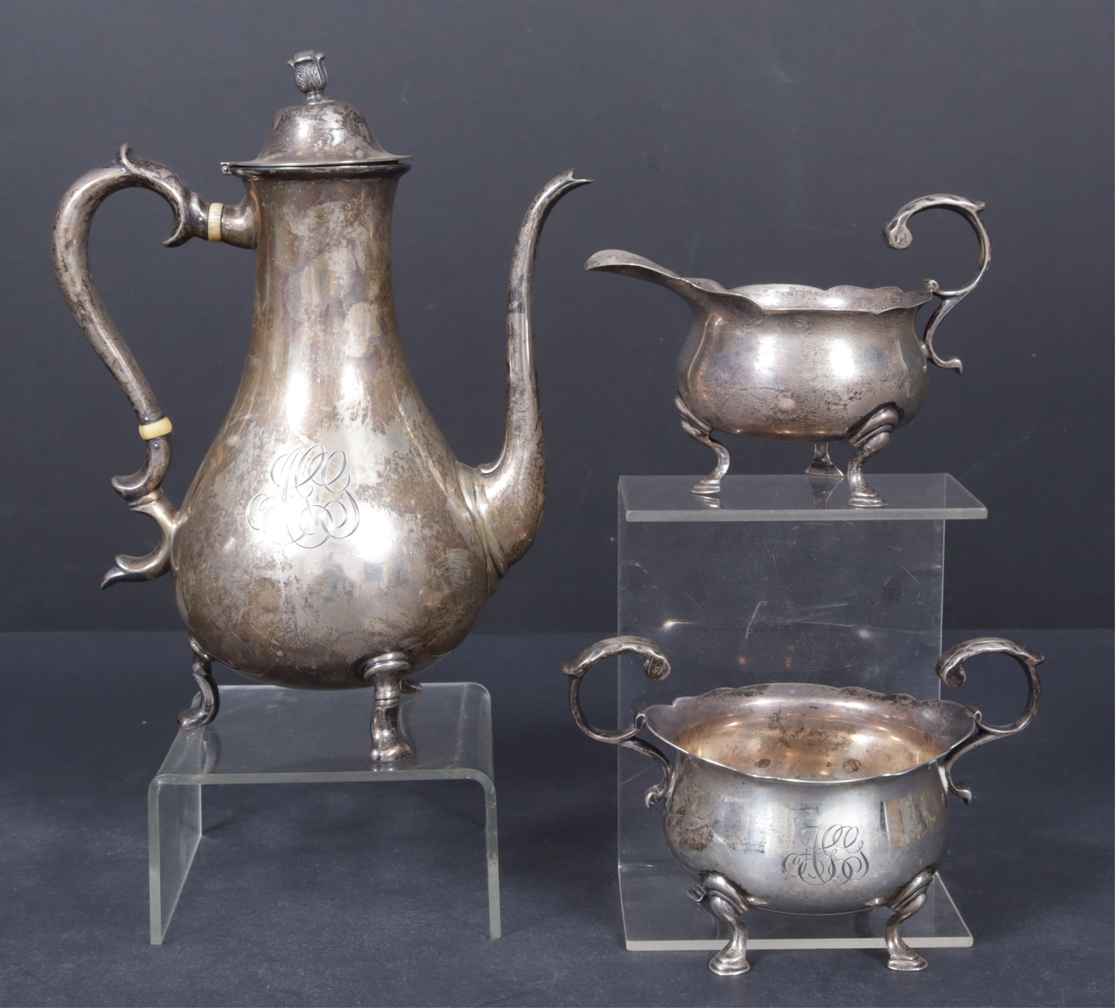 Howard & Co Sterling Silver Coffee Service: Howard & Co, New York, late 19th to early 20th C sterling silver three-piece coffee service comprising of coffee, cream, and sugar. Each piece having maker's mark and stamped sterling. Coffee