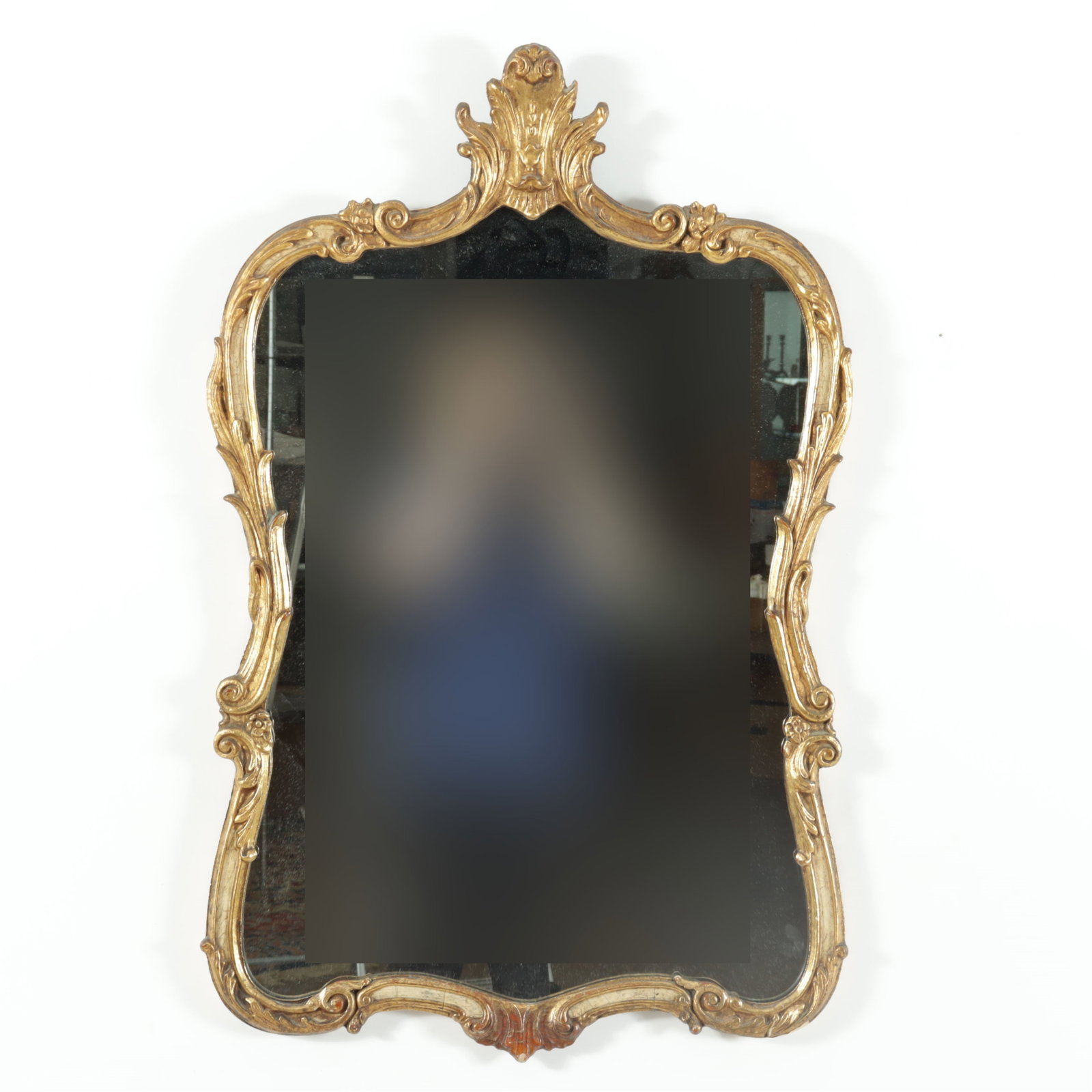 Rococo Style Gilt Composition Mirror: Rococo style gilt composition mirror with cream painted highlights. 34.25" H x 21.75" W