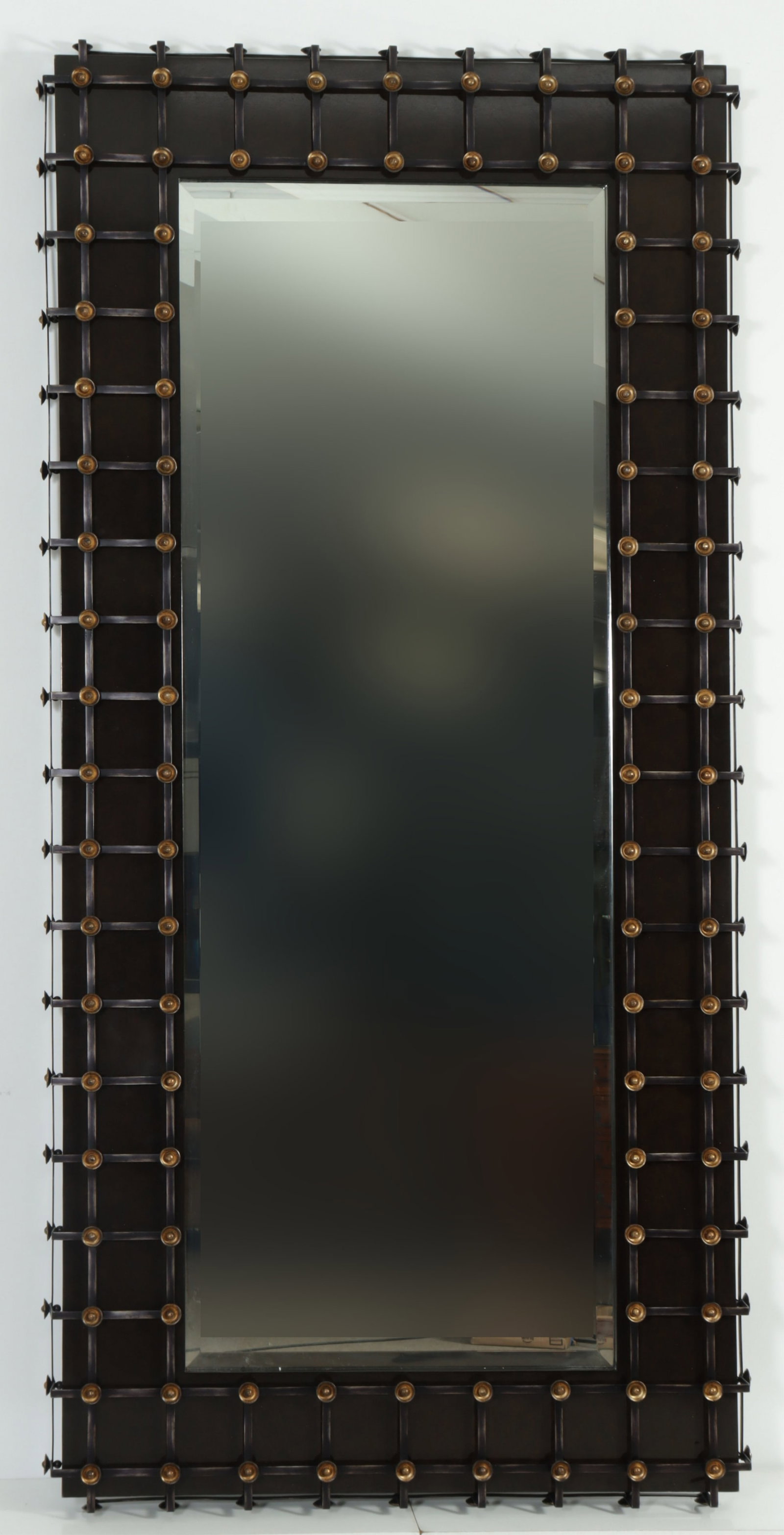 Marge Carson Cross-Channel Pier Mirror: Marge Carson Cross-Channel pier mirror with black painted metal lattice frame and beveled plate. 86" H x 41" W