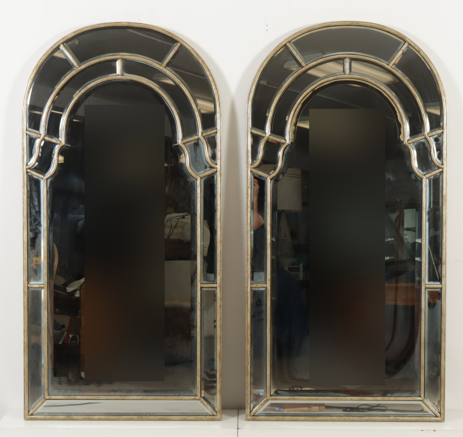 Pair Marge Carson Trianon Court Mirrors: Pair of Marge Carson Trianon Court mirrors, arched tops with silvered finish. 60" x 30" W