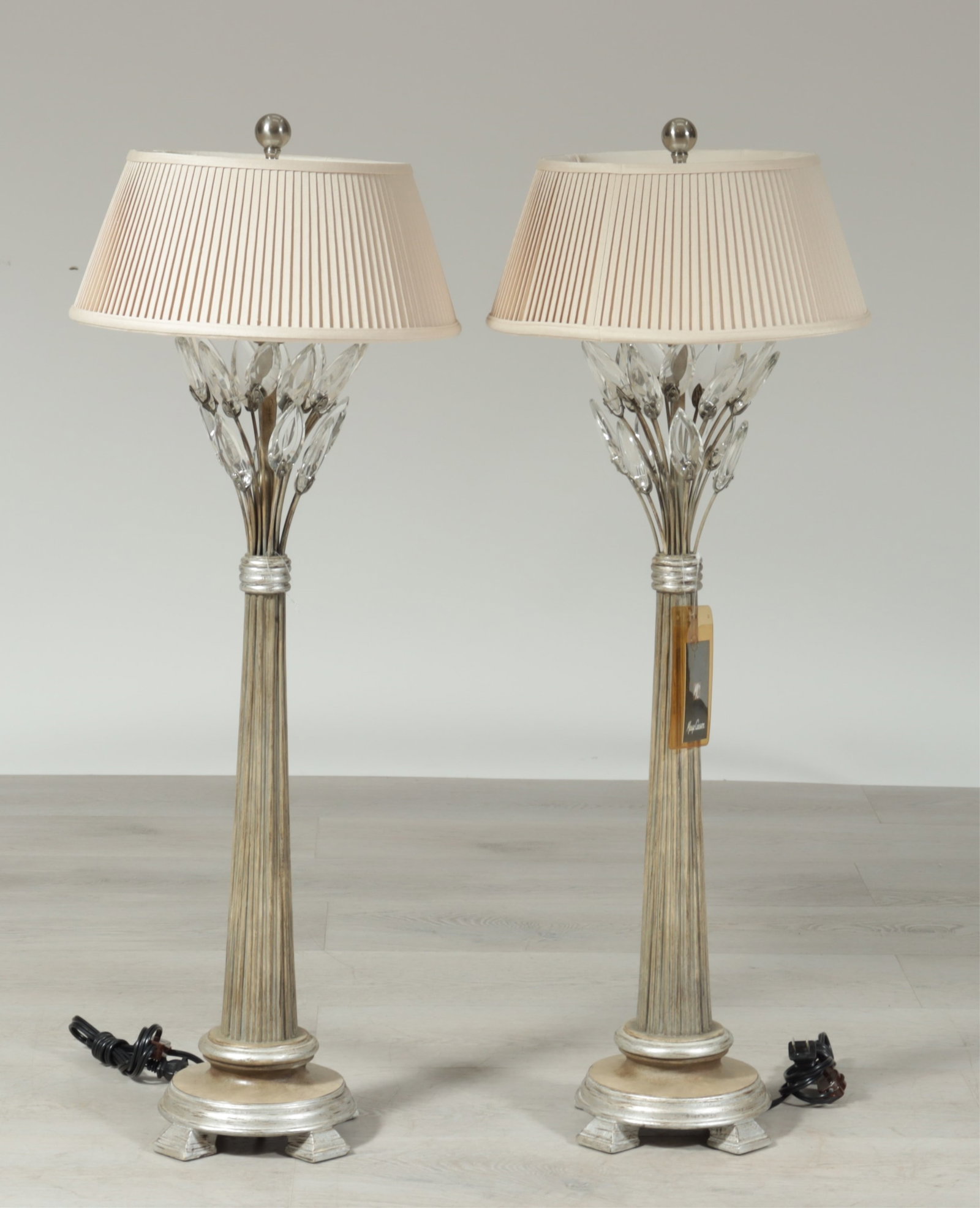 Pair of Marge Carson Lamps: Pair Marge Carson Crystal Laurel console lamps. Crystal and silvered wood, with John Richard shades. To the finial 36" H