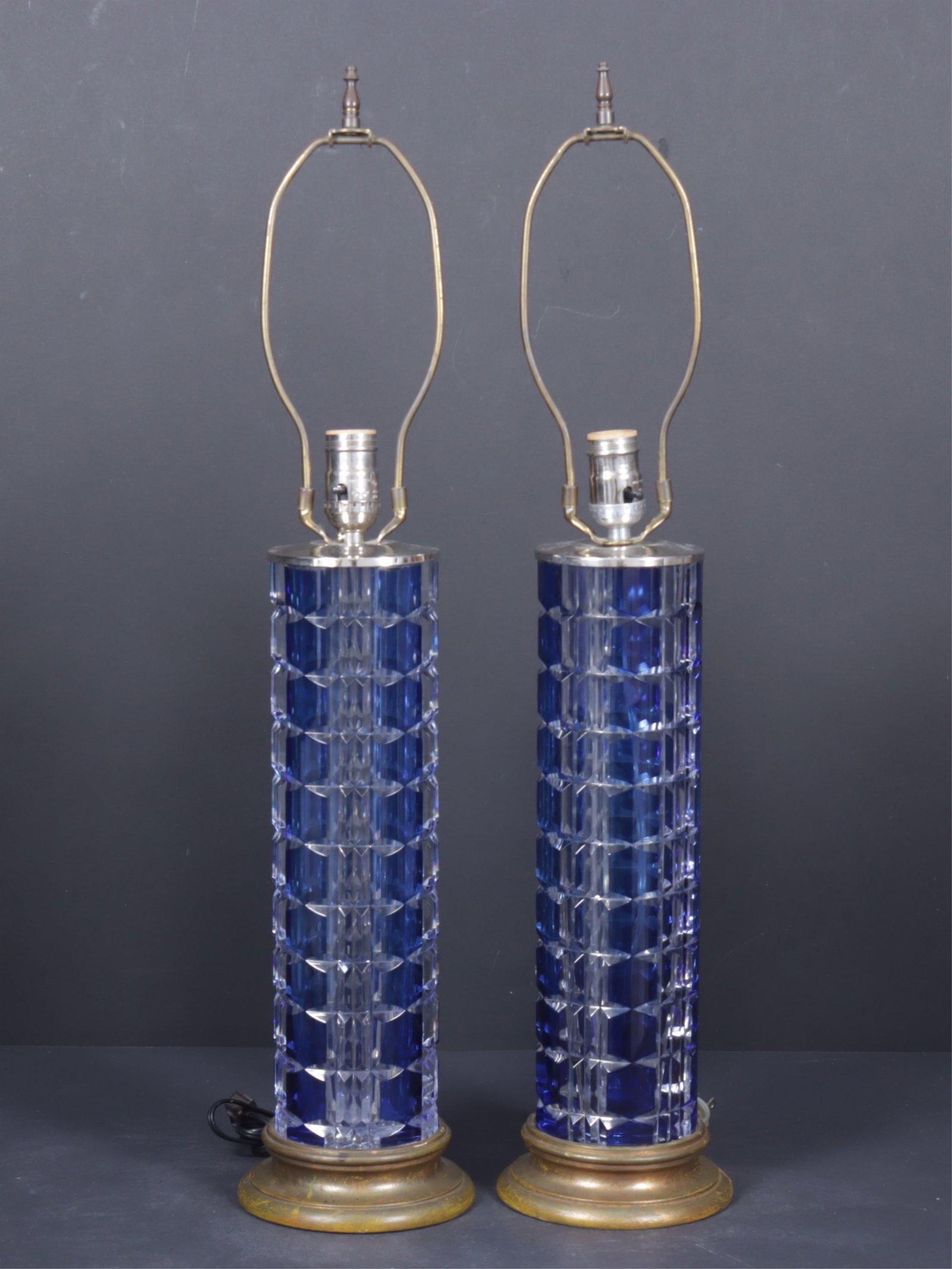 Pair Val Saint Lambert Crystal Vases as Lamps: Pair of Cristallerie du Val Saint Lambert Belgium, blue cut to clear crystal vases as table lamps, drilled for wiring, base inscribed (weight: 20 pounds) 28.5 H x 6.25 W, vase 14.5 H x 4 diameter