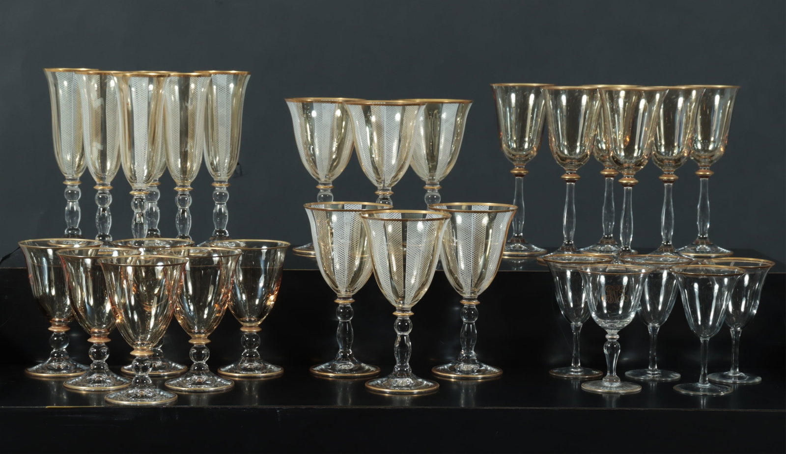 Gilt Decorated Clear, Amber & Latticino Stemware: 29 Various Gilt Decorated Clear, Amber & Latticino Stemware Largest flutes 8.25" H