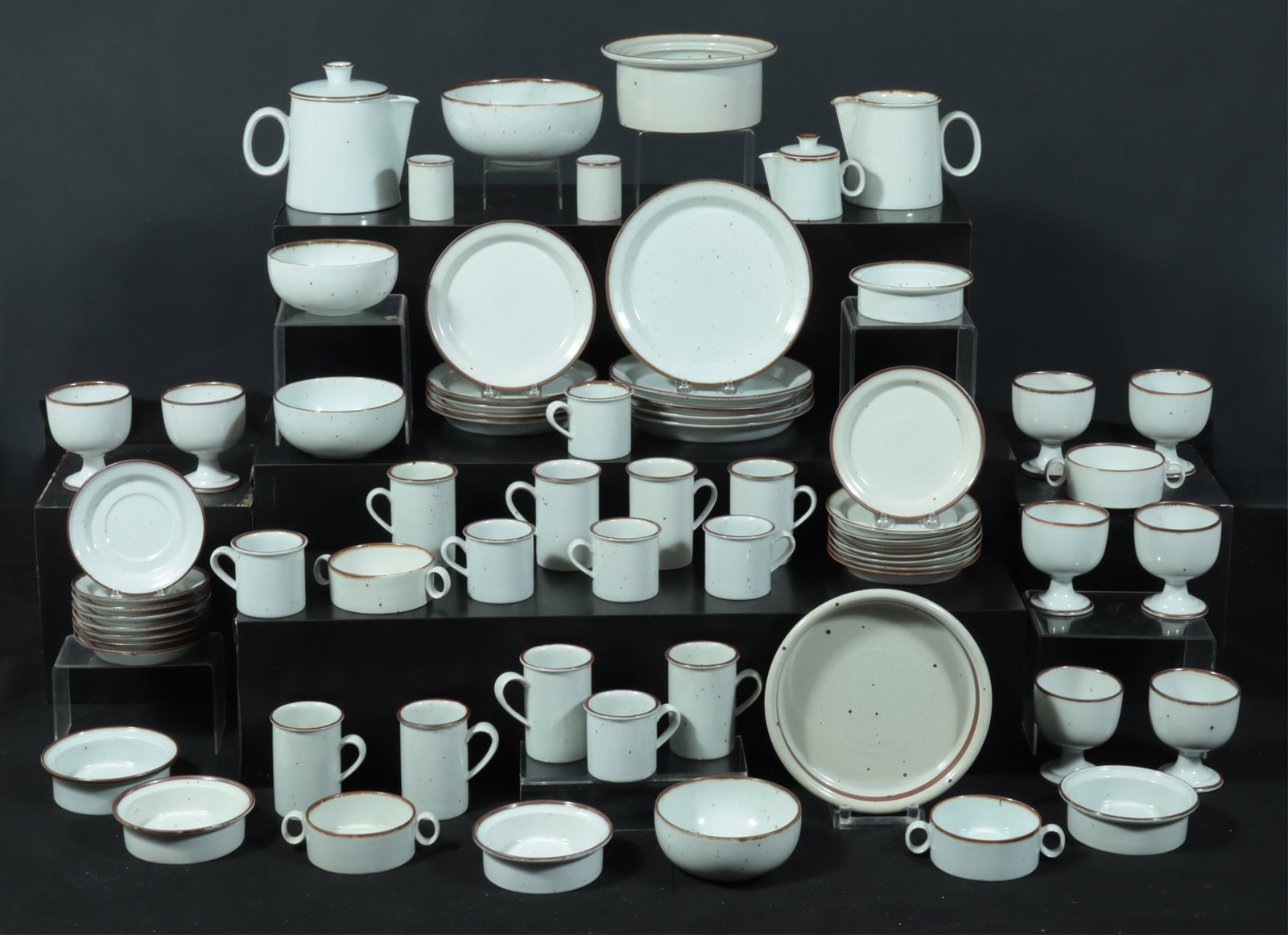 Dansk Brown Mist Stoneware by Niels Refsgaard: Assembled set of Dansk Brown Mist Stoneware by Niels Refsgaard. Circa 1970. "Dansk Designs Denmark NR" stamped on bottom. Dinner Plates (5) 10" dia. Salad Plates (5) 8.25' dia. Bread Plates (8) 7" dia