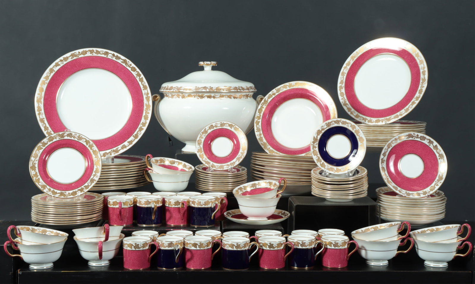 120 Pcs. Wedgwood Whitehall Dinner Service: Collection of 120 pieces Wedgwood Powder Ruby and Mazarine Blue bone china, service for 12, includes 11 Mazarine Blue demitasse cups, 12 Mazarine Blue demitasse saucers, 12 Powder Ruby demitasse cups,