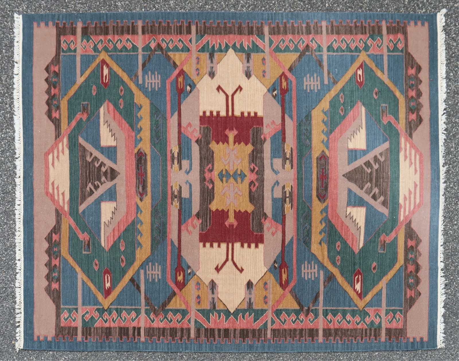 Turkish Kilim Rug 7-9 x 9-6: Turkish Kilim woven wool rug, 3 large medallions of geometric form, colors include blues, green, red and mustard yellow 7-9 x 9-6