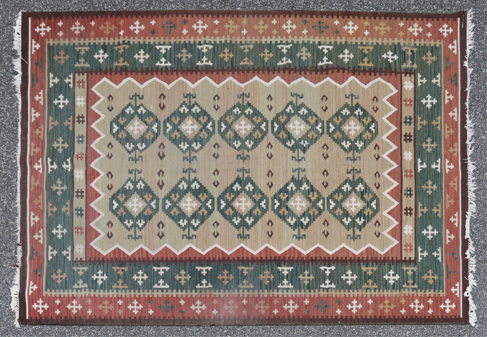 Indian Dhurrie Rug 8 X 11: Indian Dhurrie woven wool rug, rust green and tan grounds throughout, ten central medallions 8 X 11