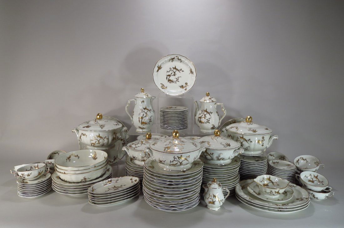 Major Bernardaud Limoges Svc., "Reine Elizabeth", 150pc: Huge Bernardaud Limoges Porcelain Table Service in the "Reine Elizabeth" Pattern, late 20th c.; each decorated with gilt stylized floral sprays, branches and birds; comprises tea pots, a creamer, cove