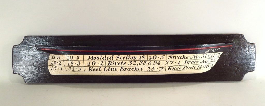 Two Half Hull Ship Models: Two 1/2 Hull Ship Models, one green and copper color, the other painted with numbers and specifications (2 pcs.) (LCA7501/2) (WT) Dimensions:12" H x 32" L x 5" D and 8 1/2" H x 43" L x 4" D Condition: