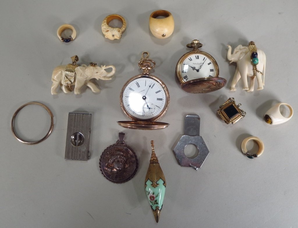 Jewelry and Misc. Accessories: Gold filled Waltham pocket watch, green glass pendant perfume, cigar cutters, locket, 2 bone elephants (made into pendants), rings etc.. 14 pcs. (MUSS7852/14) {KR}(MUSS) Dimensions:Various sizes Condi