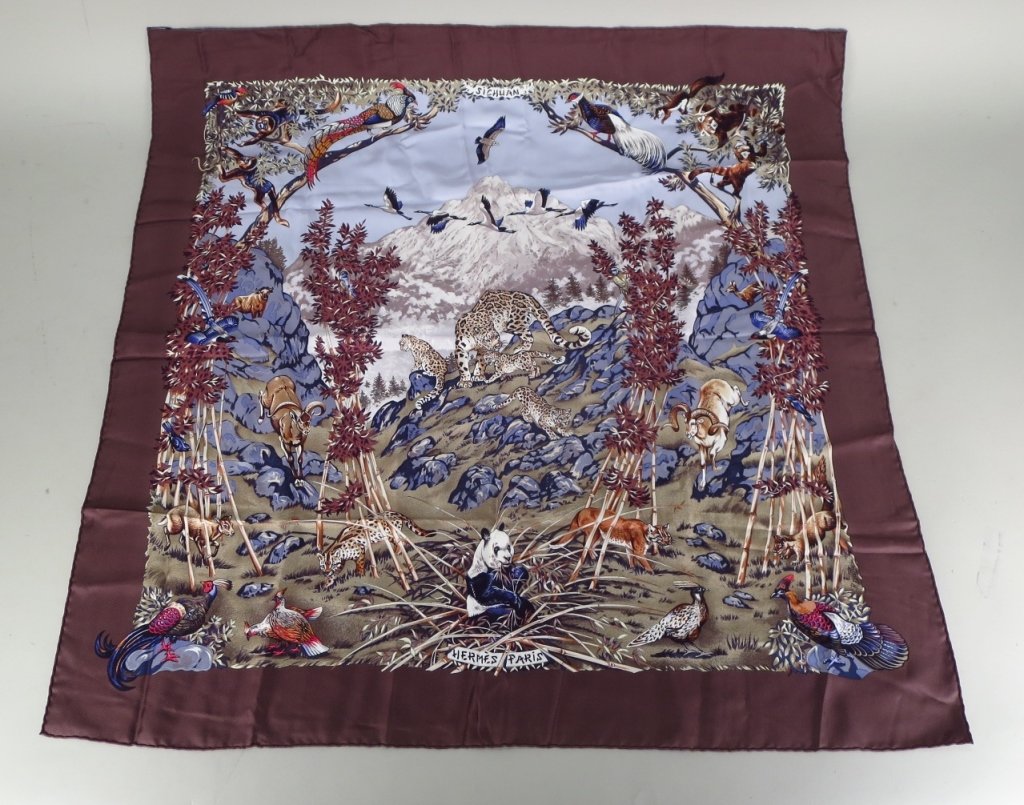Hermes Scarf "Sickman" by Robert Dallet: Hermes silk scarf titled "Sickman" by artist Robert Dallet. Brown border with jungle animals. (LUCE7800) {KR}(LUCE) Dimensions:35" Condition:Use wear
