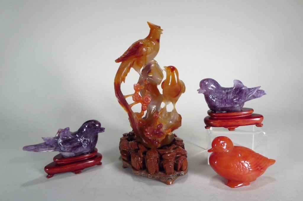 4 Chinese Carved Birds: 4 Chinese carved hardstone birds. A carnelian duck, an agate group and 2 amethyst bird form boxes [54](FLORA8308/4) Measurements: 2"-6" Condition: Damage to wigs and tails of both amethyst birds Prope