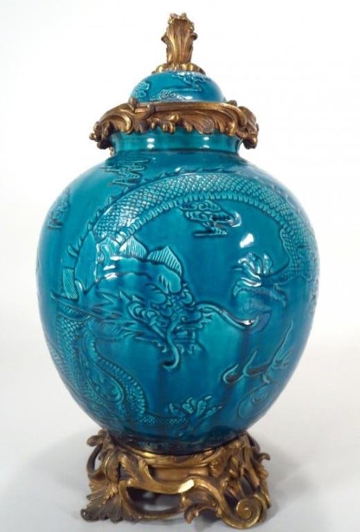 Chinese Export Dragon Vase, 19th C.: Chinese Export Dragon Lidded Vase with Ormolu Mounts, 19th C., turquoise glaze (69)(ELBE6249) Measurements: 16 H Condition: Some metal oxidation, otherwise good. Property Title: Property of an Elberon