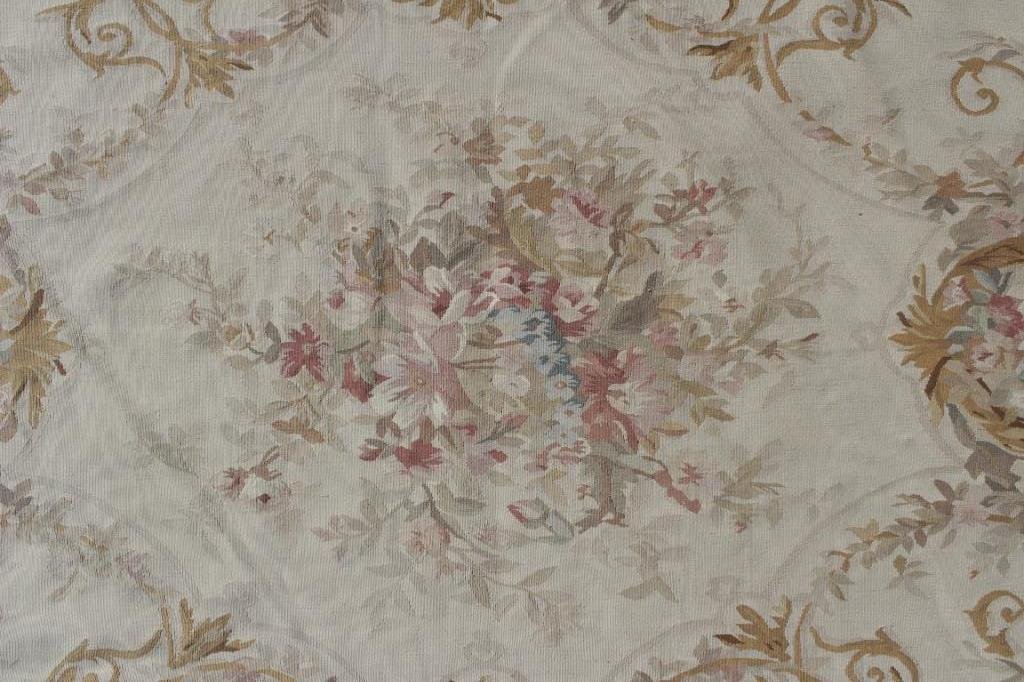 Aubusson Style Carpet, 20th c: Aubusson Style Carpet, 20th century, the pale beige ground with yellow/brown scrolling foliage and partial flowers (BCOL6560) Measurements: 11'8" x 17'10" Condition: Good condition with some fading of