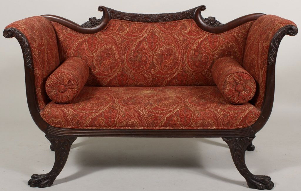 Federal Style Mahogany Settee: Federal style mahogany settee circa 1900, red paisley upholstery(AFPAT8510) Measurements: 34.5" H x 53.5"W x 22.5"D Condition: loss to floral petal on crest rail, repair to arm, slight scuffing. Prope